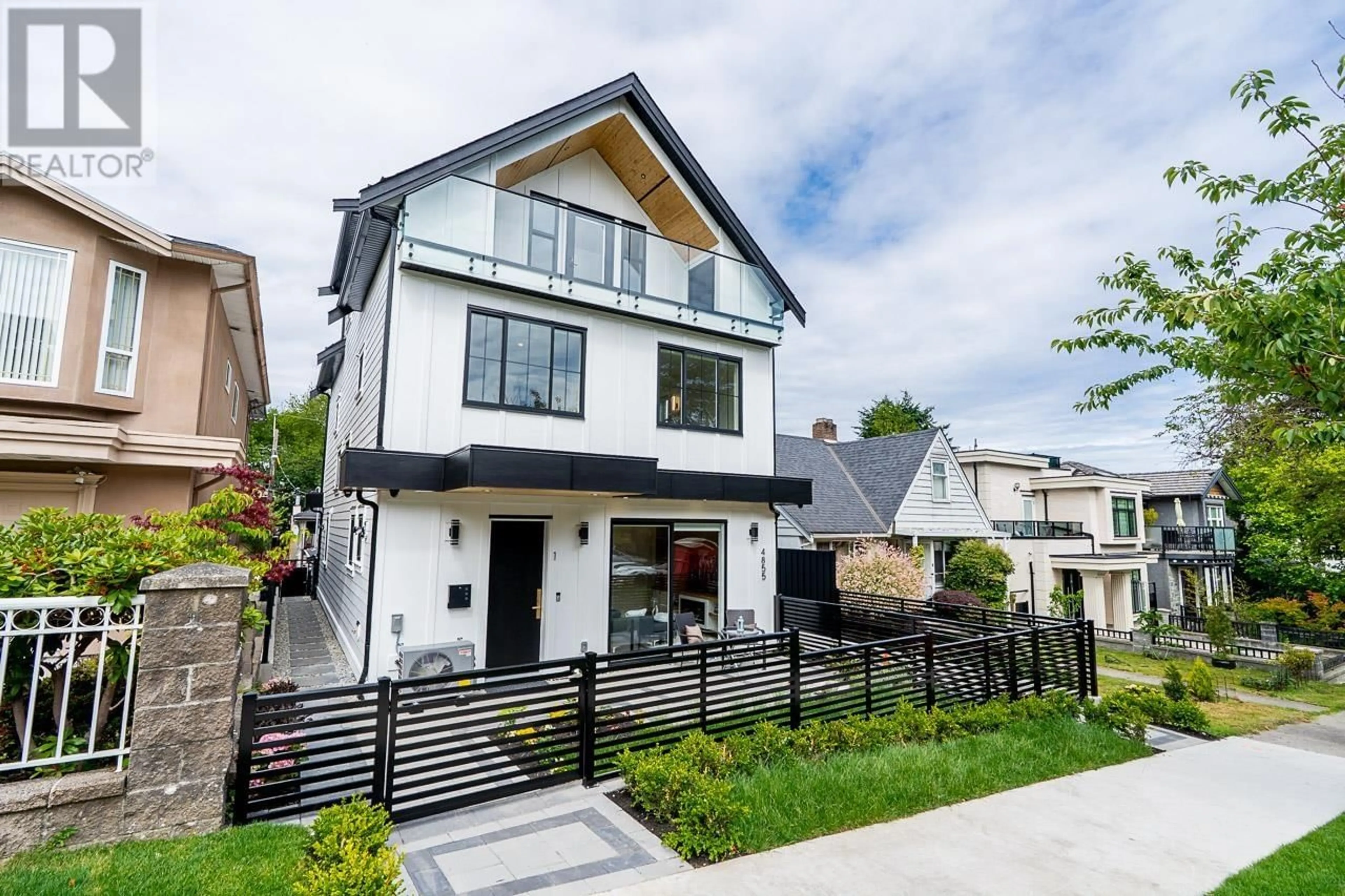 Home with brick exterior material, street for 1 - 4855 DUMFRIES STREET, Vancouver British Columbia V5N3T8