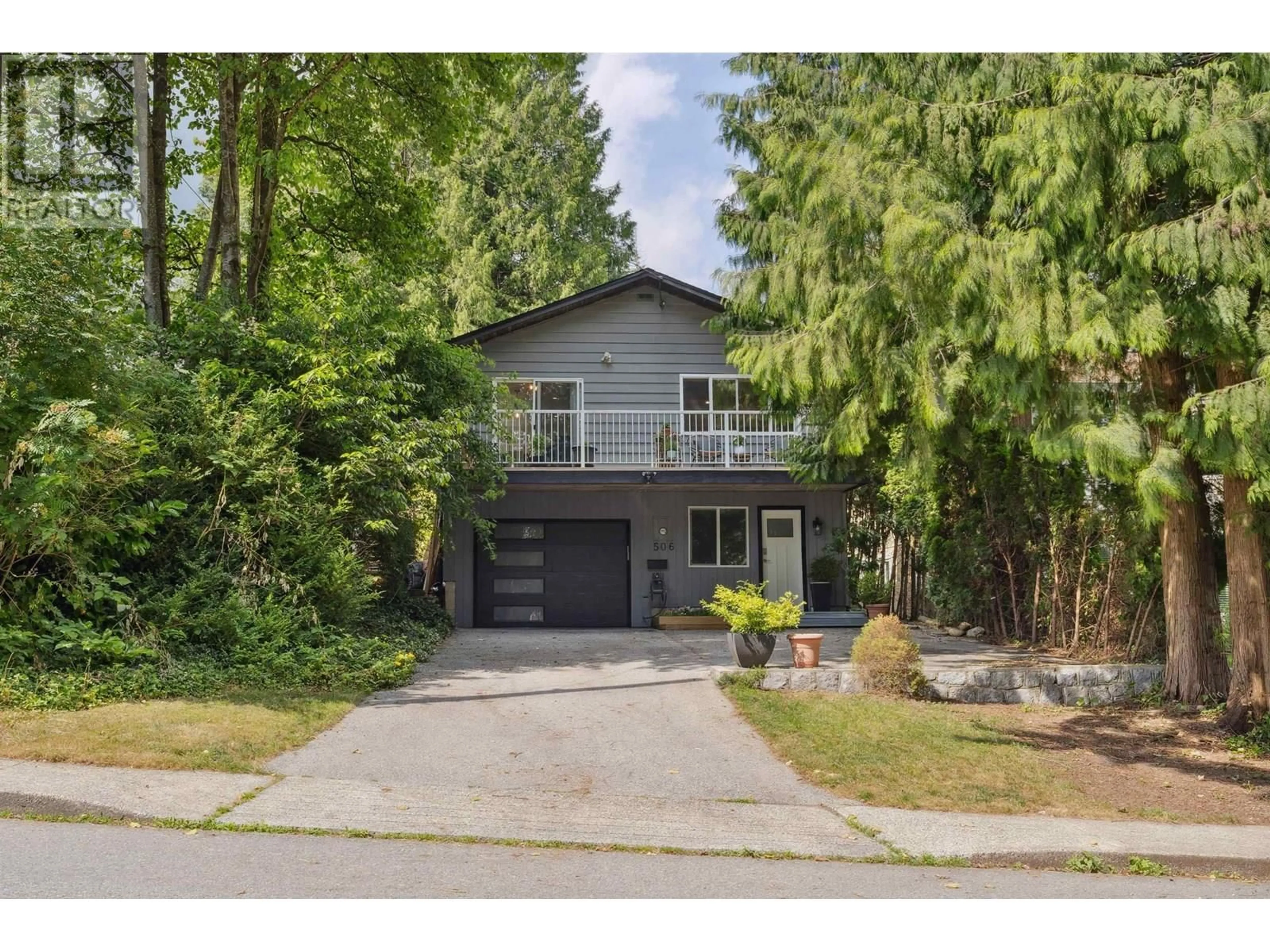 Home with vinyl exterior material, street for 506 21ST STREET, North Vancouver British Columbia V7L3C3