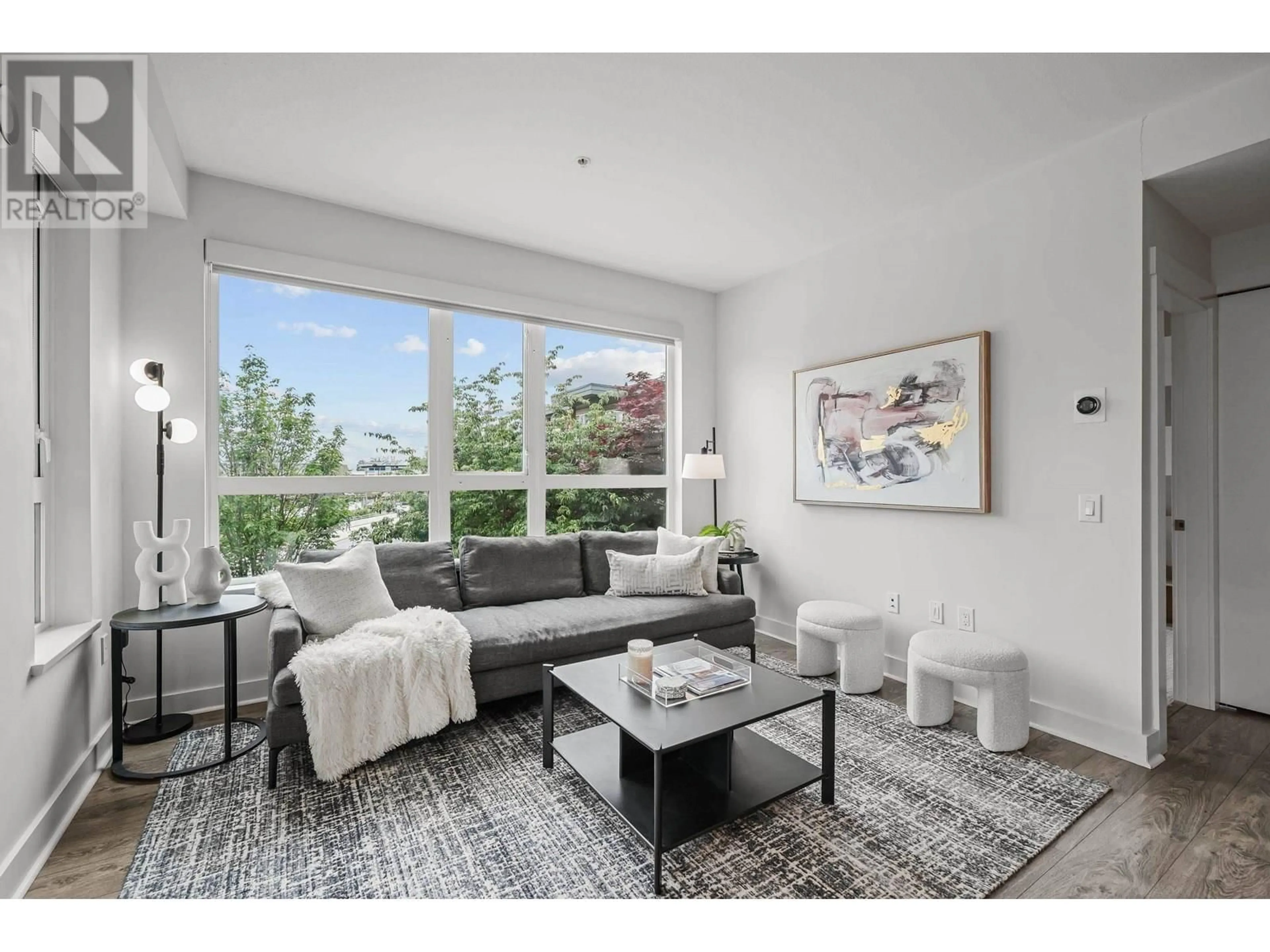 Living room with furniture, unknown for 309 - 733 14TH STREET, North Vancouver British Columbia V7M0C6