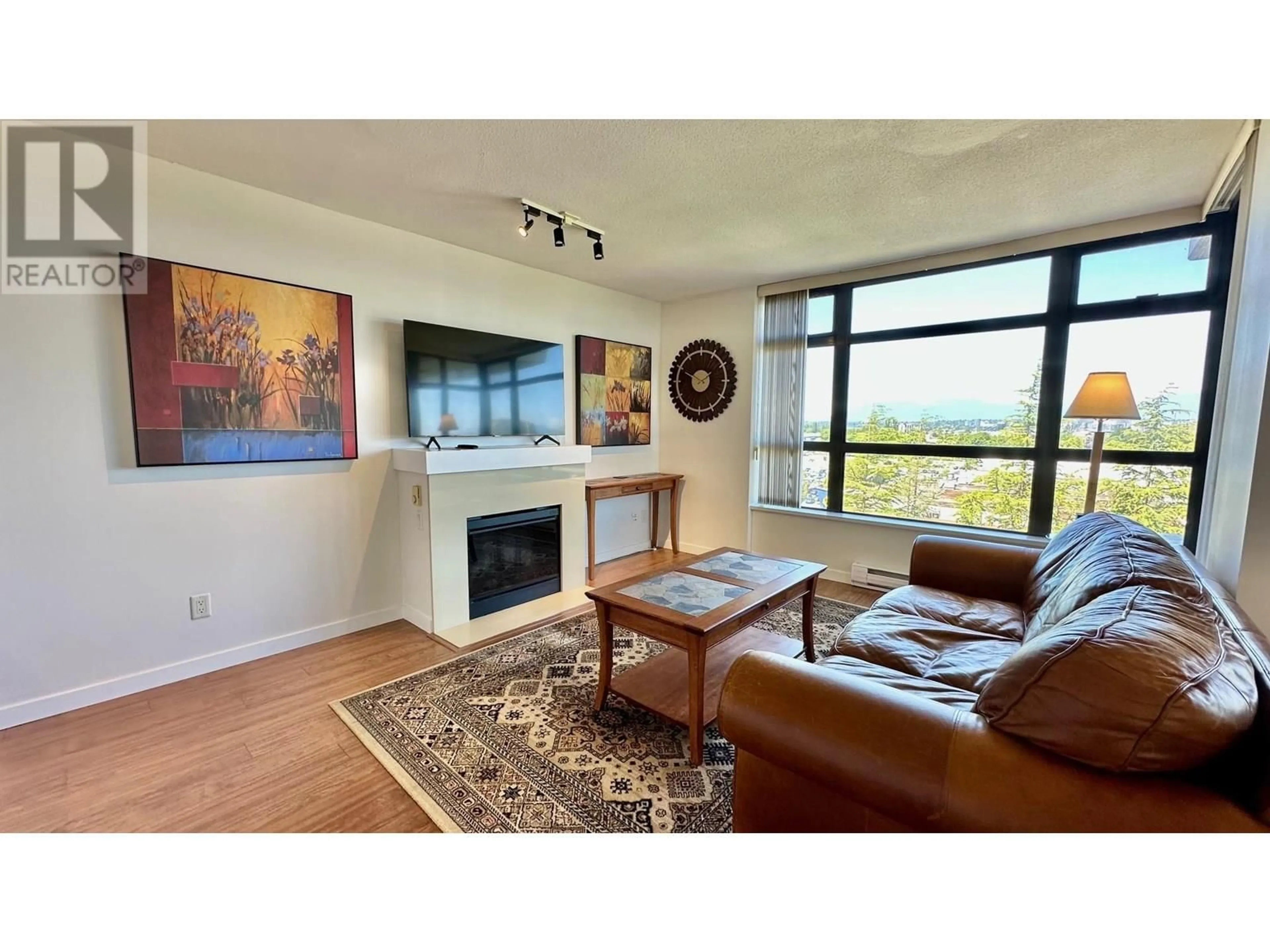 Living room with furniture, wood/laminate floor for 902 - 8160 LANSDOWNE ROAD, Richmond British Columbia V6X0A9