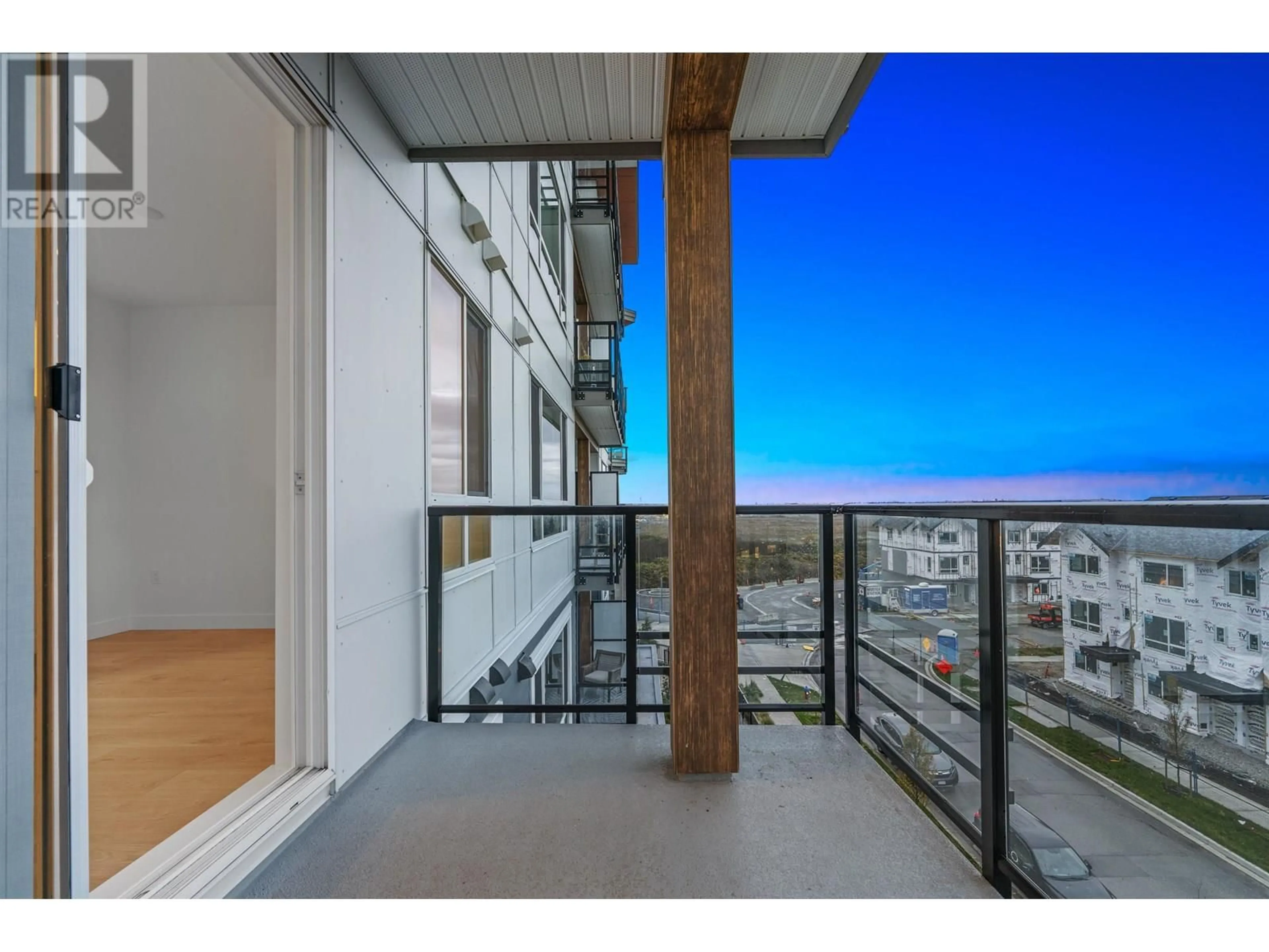 Balcony in the apartment, city buildings view from balcony for 410 - 2499 RABBIT DRIVE, Tsawwassen British Columbia V4M0G4