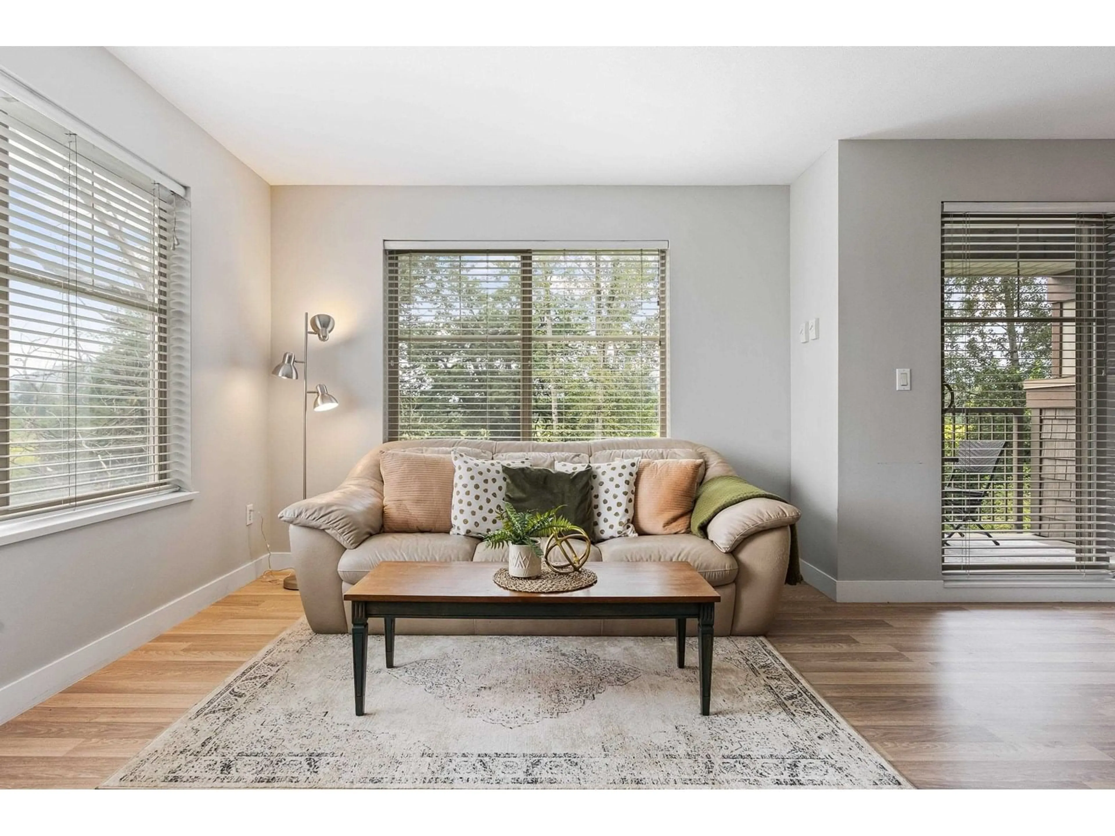Living room with furniture, wood/laminate floor for 211 - 45559 YALE ROAD, Chilliwack British Columbia V2P0B1