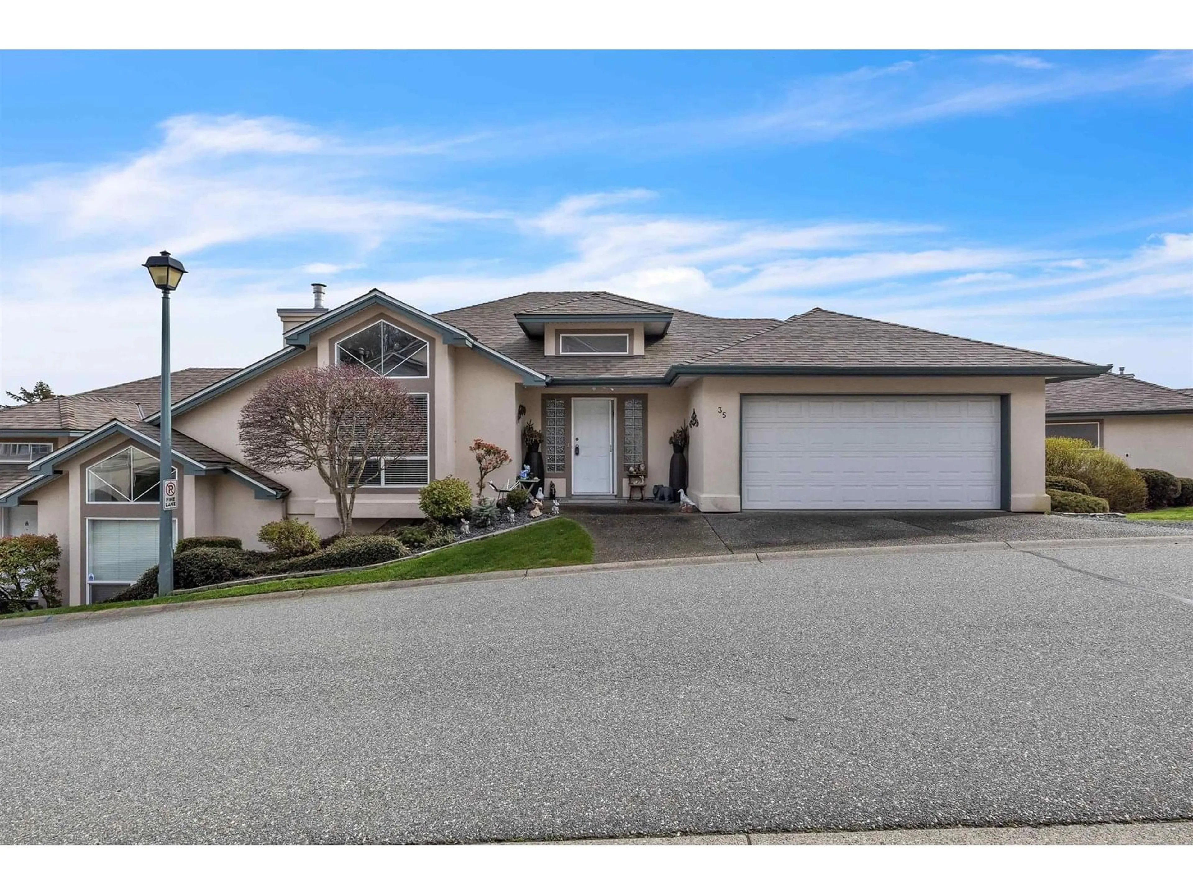 A pic from outside/outdoor area/front of a property/back of a property/a pic from drone, street for 35 - 8590 SUNRISE DRIVE, Chilliwack British Columbia V2R3Z4