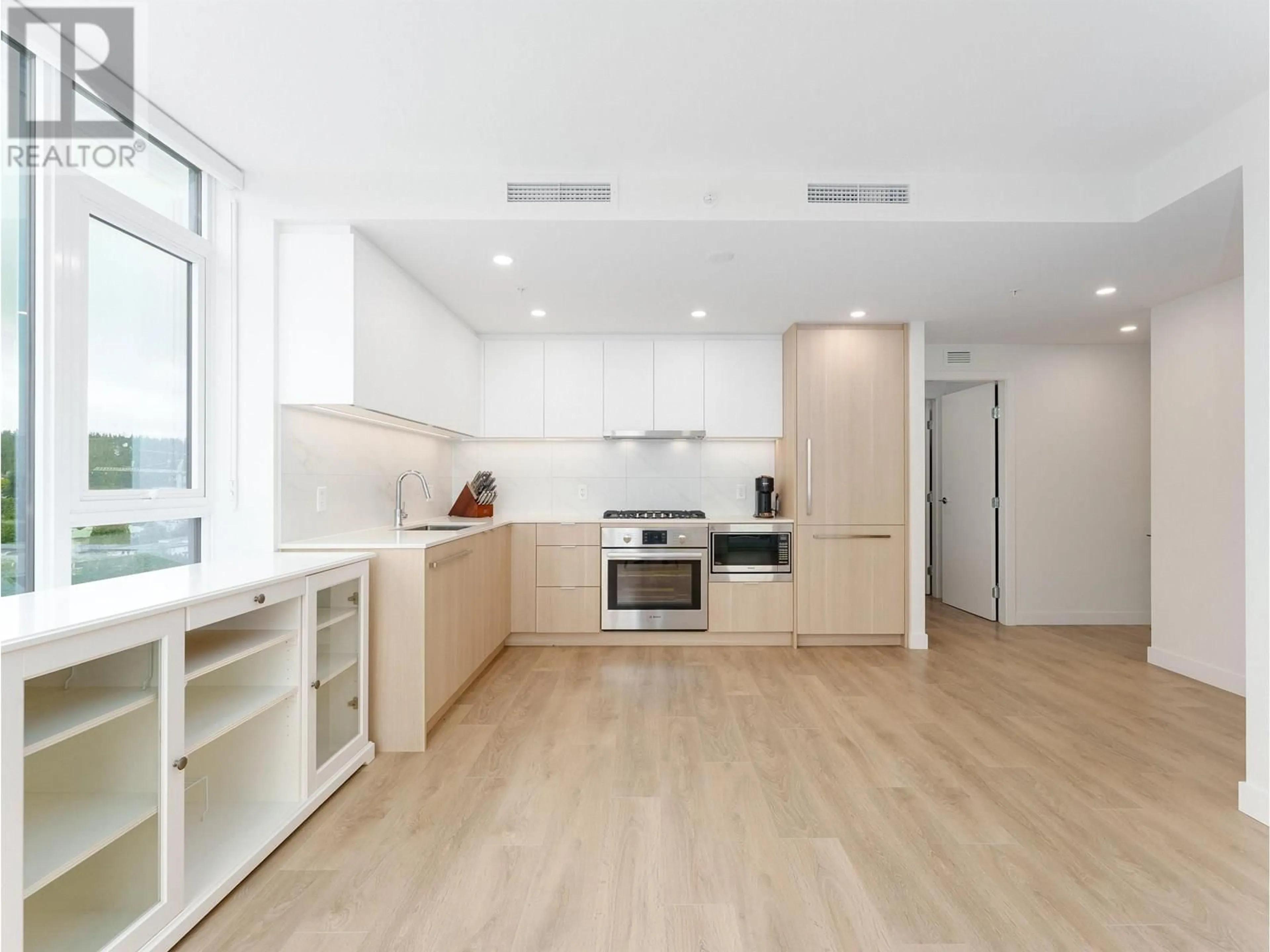 Open concept kitchen, wood/laminate floor for 1809 - 318 ALDERSON AVENUE, Coquitlam British Columbia V3K0J1