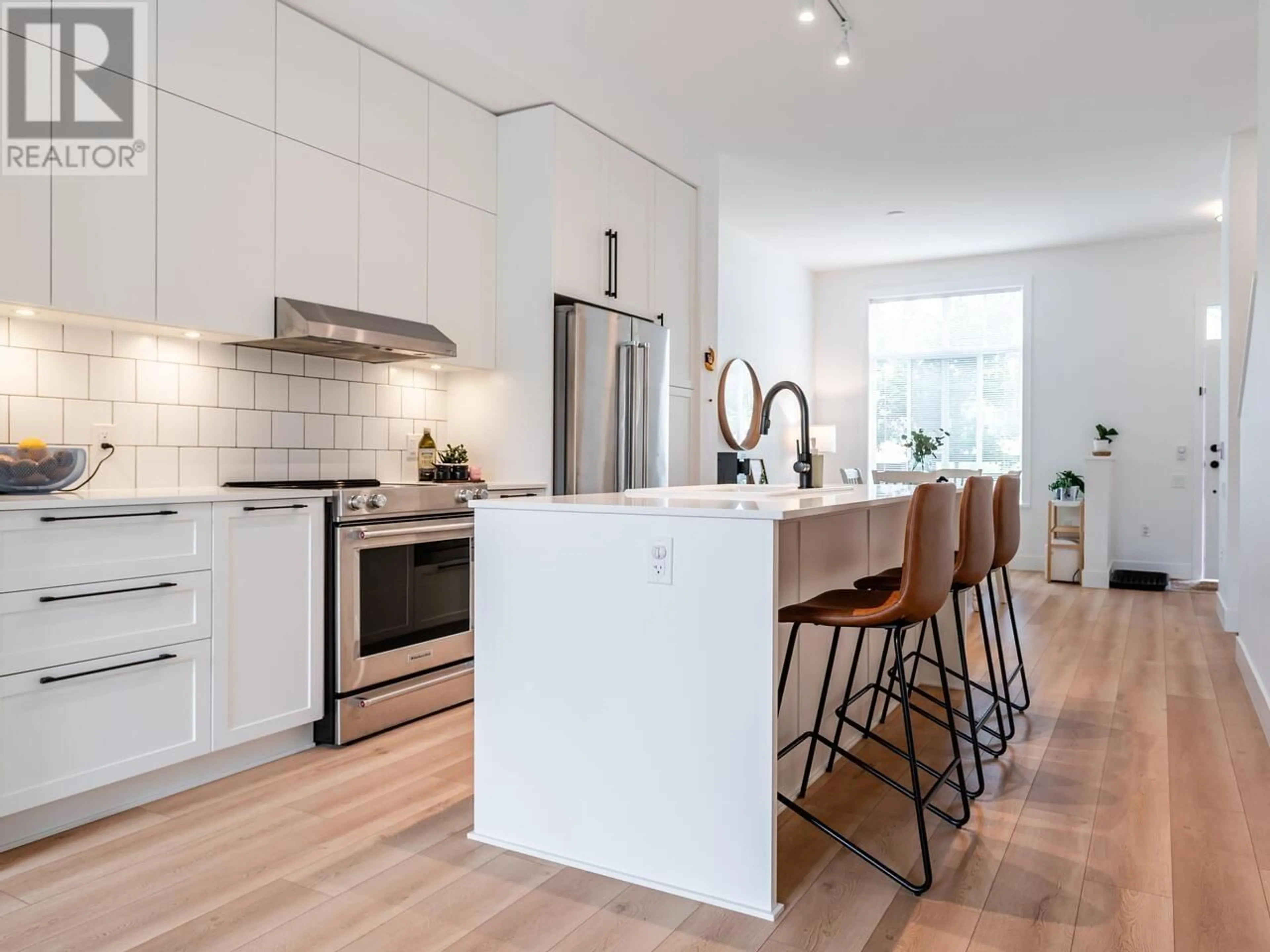Open concept kitchen, wood/laminate floor for 148 - 3529 BAYCREST AVENUE, Coquitlam British Columbia V3B0S3