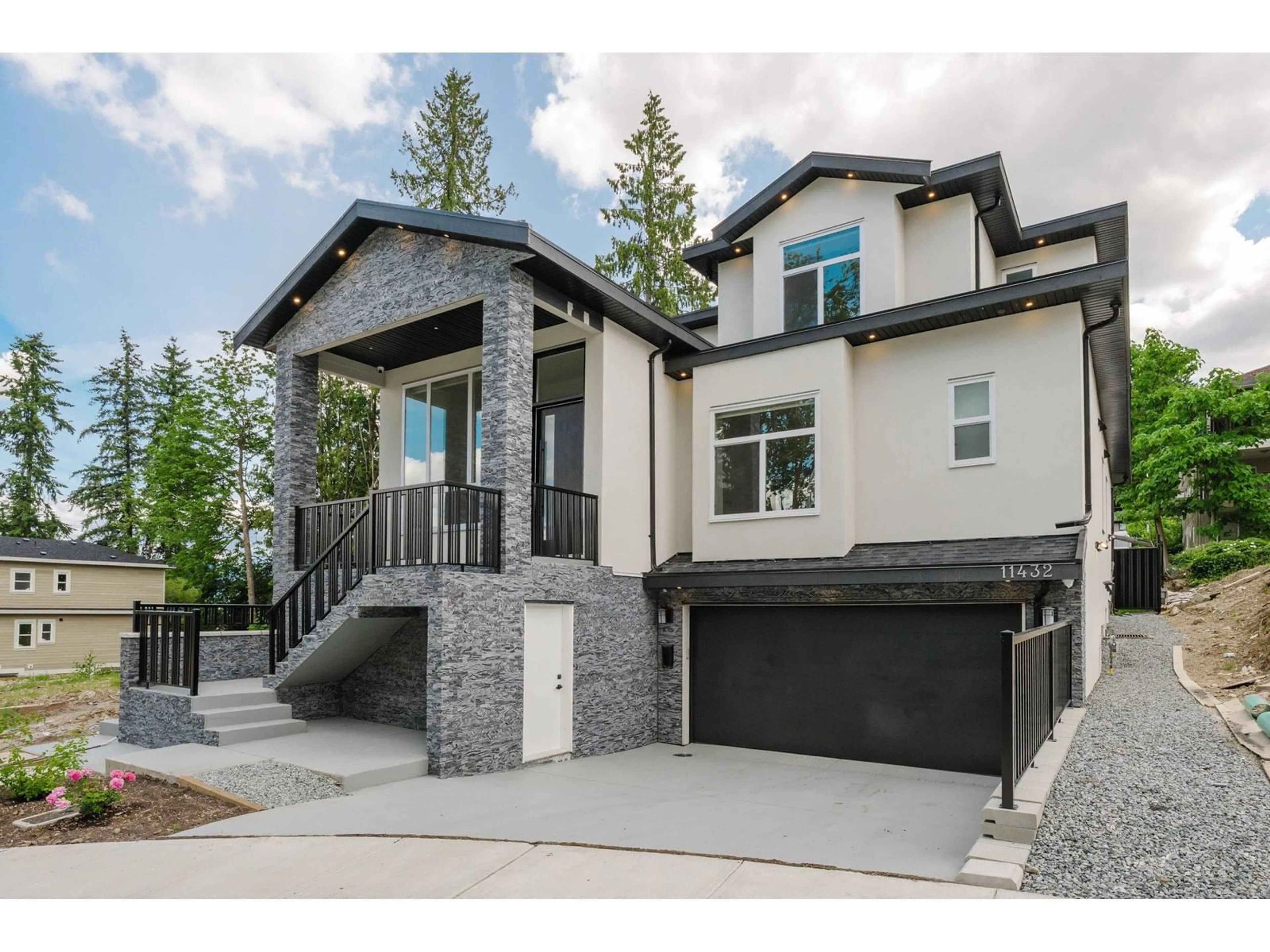 Home with brick exterior material, unknown for 11432 138A, Surrey British Columbia V3T4L1