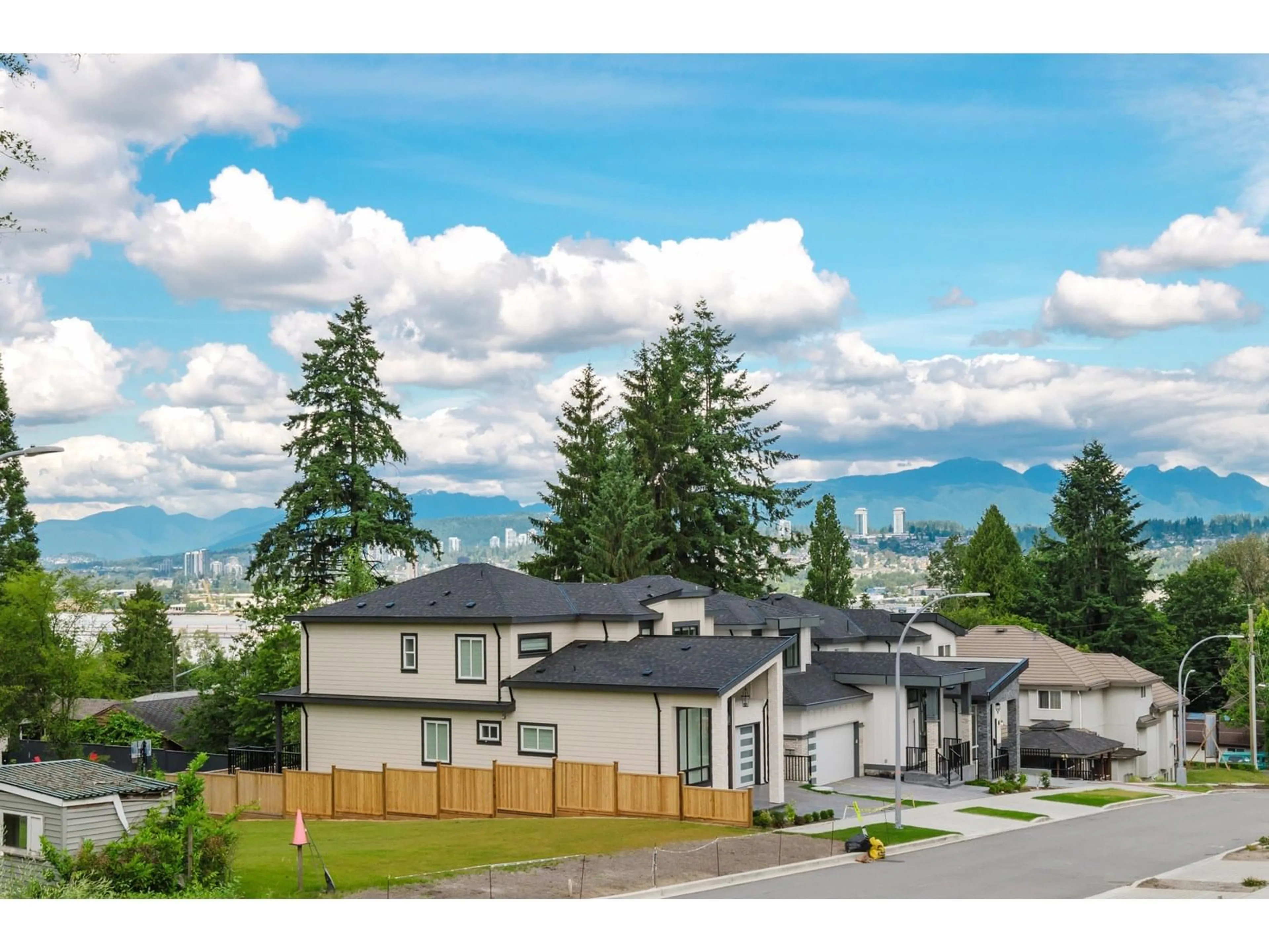 A pic from outside/outdoor area/front of a property/back of a property/a pic from drone, mountain view for 11432 138A, Surrey British Columbia V3T4L1