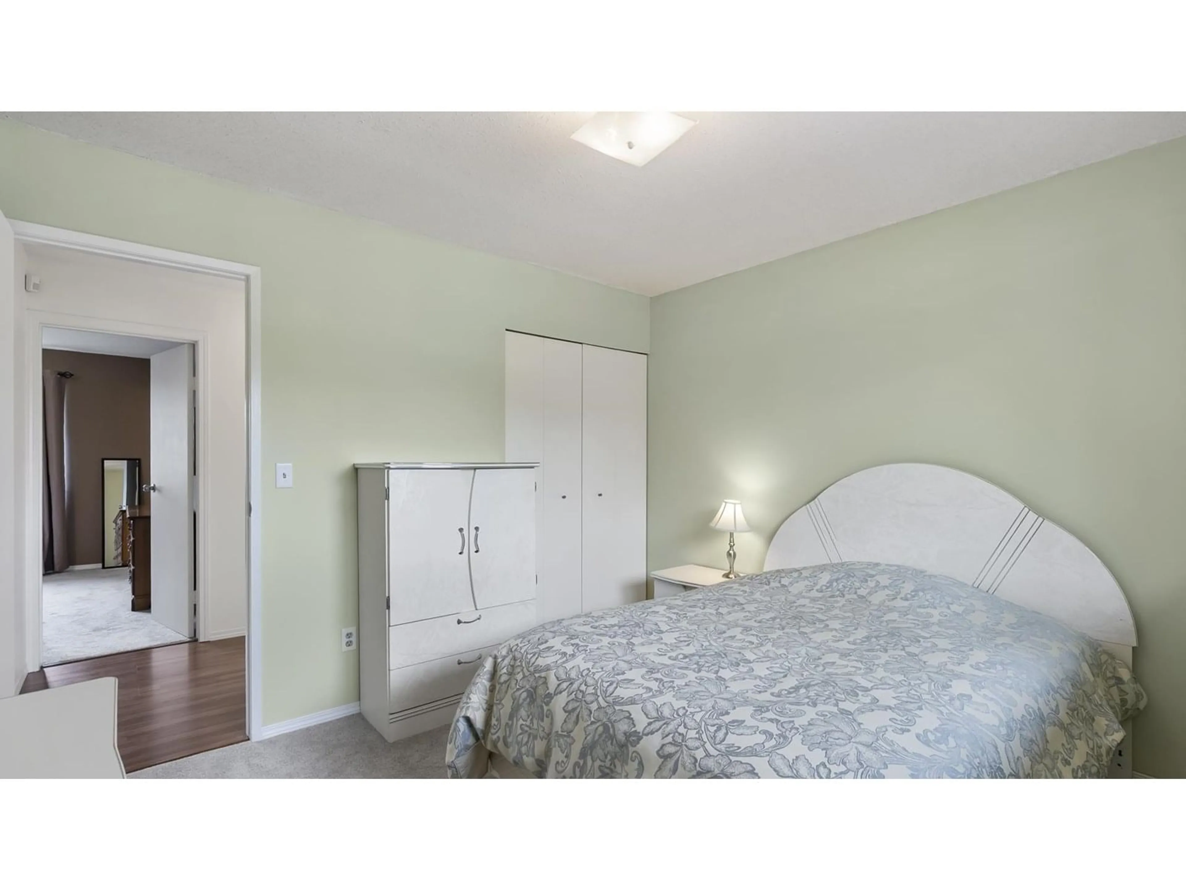 Bedroom with bed, wood/laminate floor for 15252 97, Surrey British Columbia V3R8P9