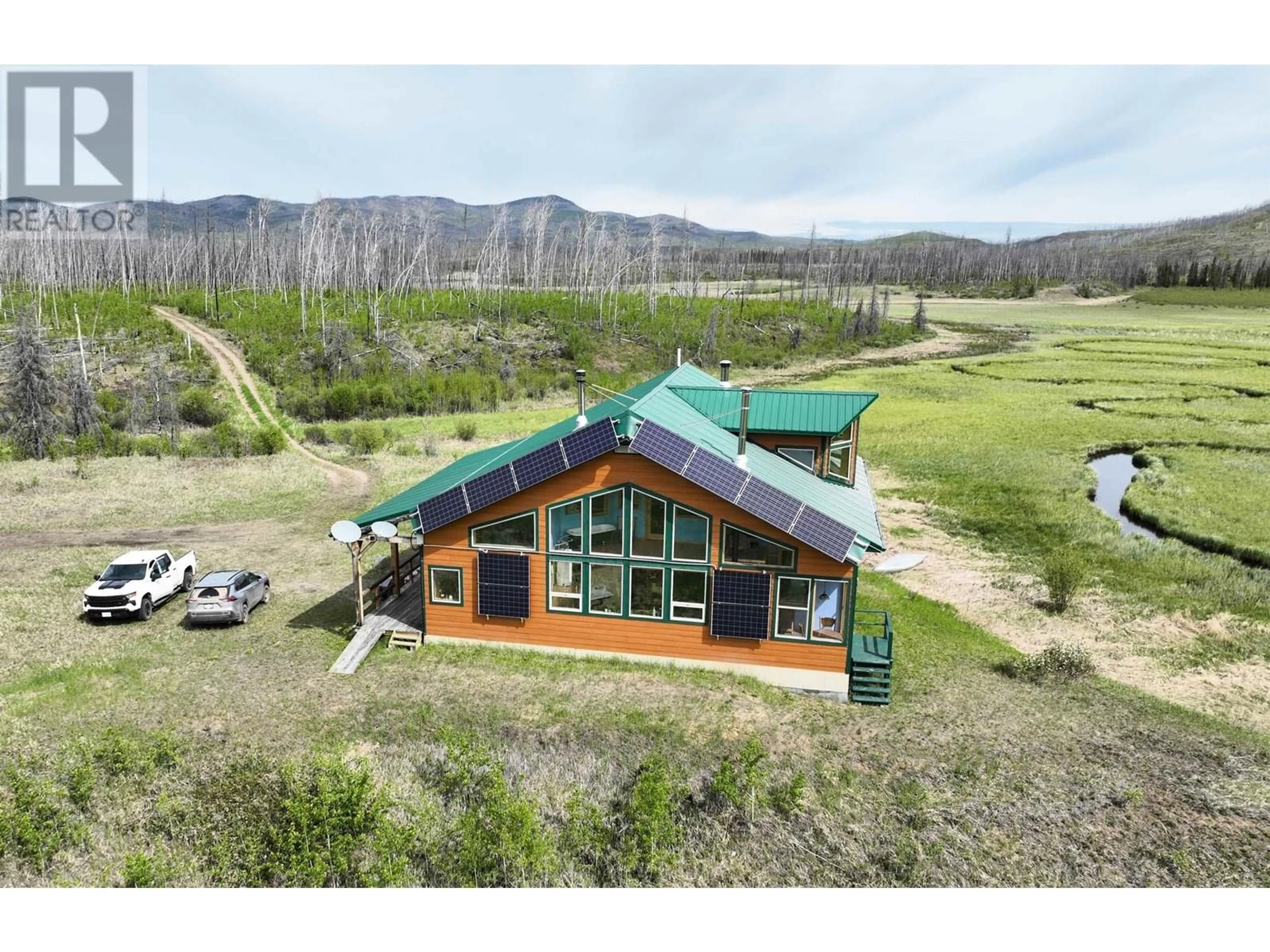 A pic from outside/outdoor area/front of a property/back of a property/a pic from drone, mountain view for 9397 NAZKO ROAD, Nazko British Columbia V2J3H9