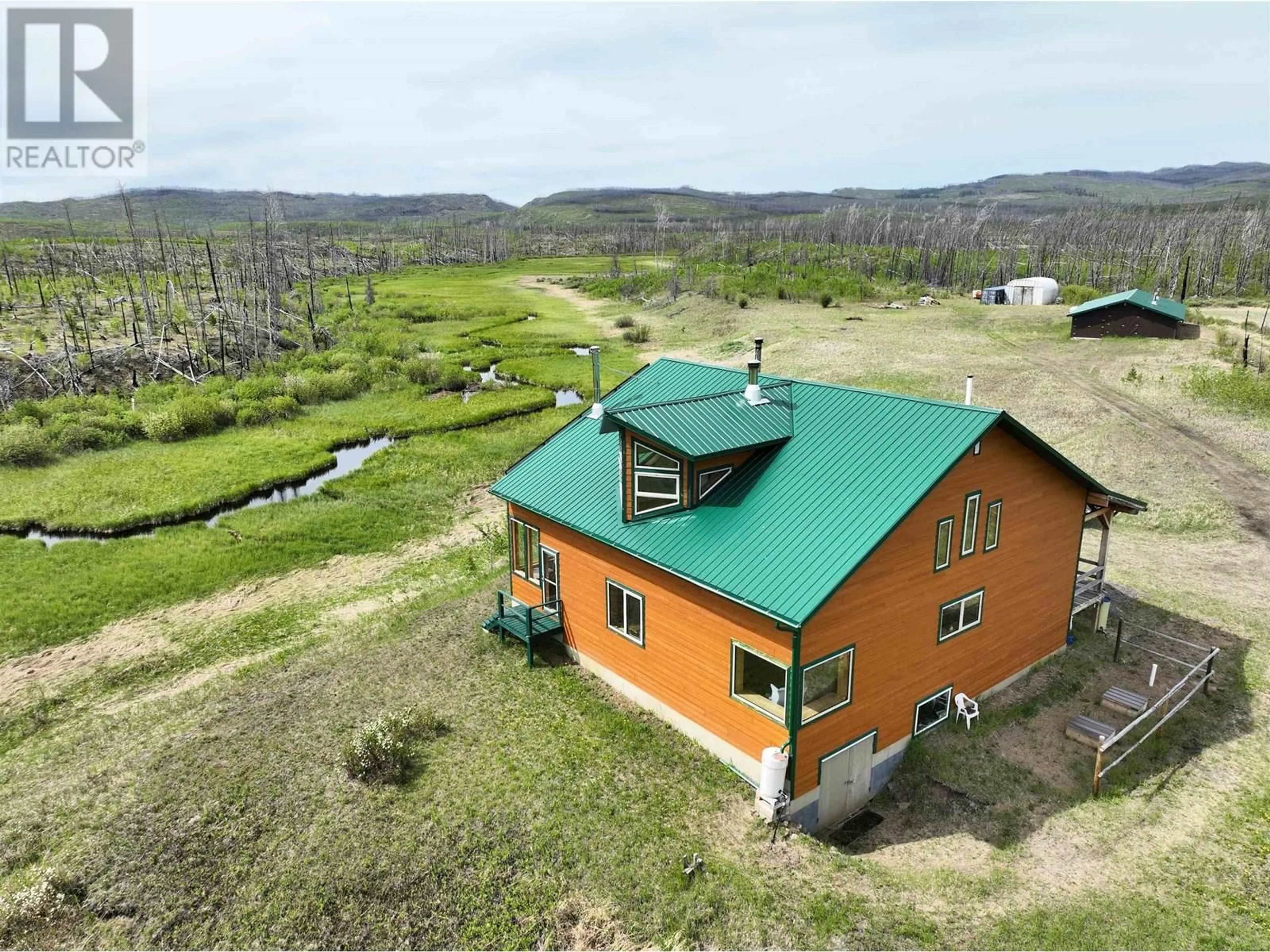 A pic from outside/outdoor area/front of a property/back of a property/a pic from drone, unknown for 9397 NAZKO ROAD, Nazko British Columbia V2J3H9