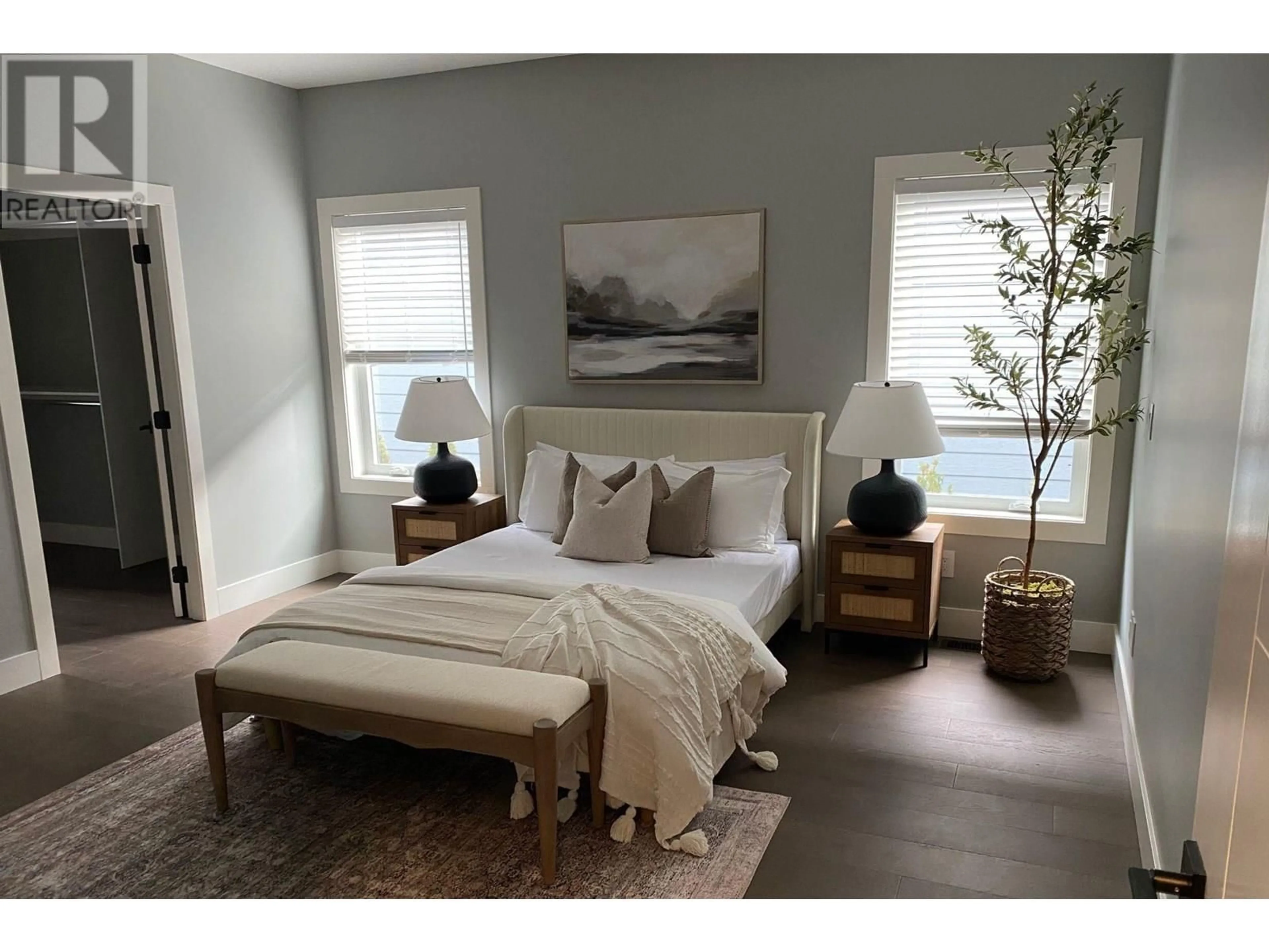 Bedroom with bed, wood/laminate floor for 307 - 9800 SINTICH ROAD, Prince George British Columbia V2N6E2