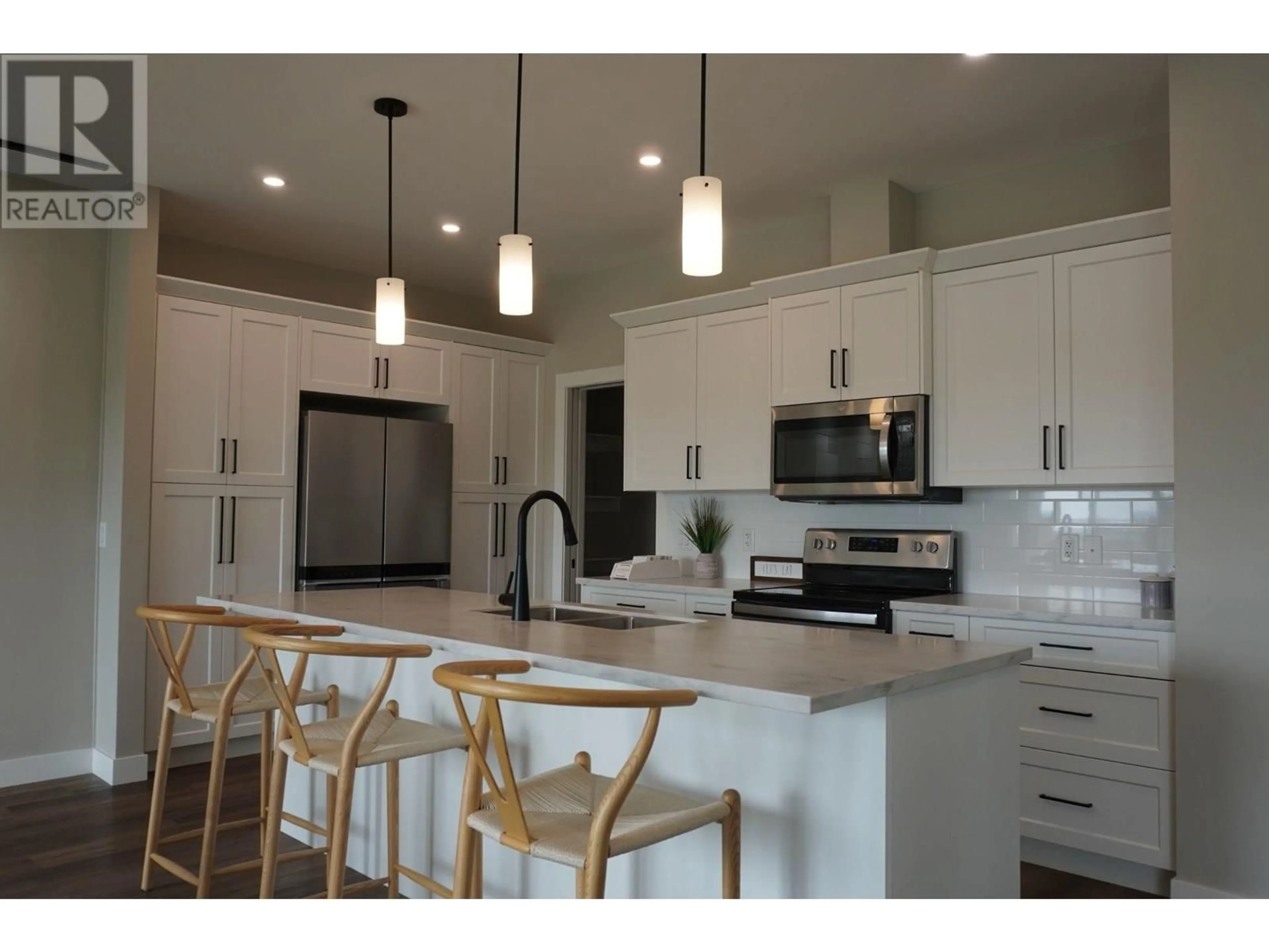 Open concept kitchen, unknown for 307 - 9800 SINTICH ROAD, Prince George British Columbia V2N6E2