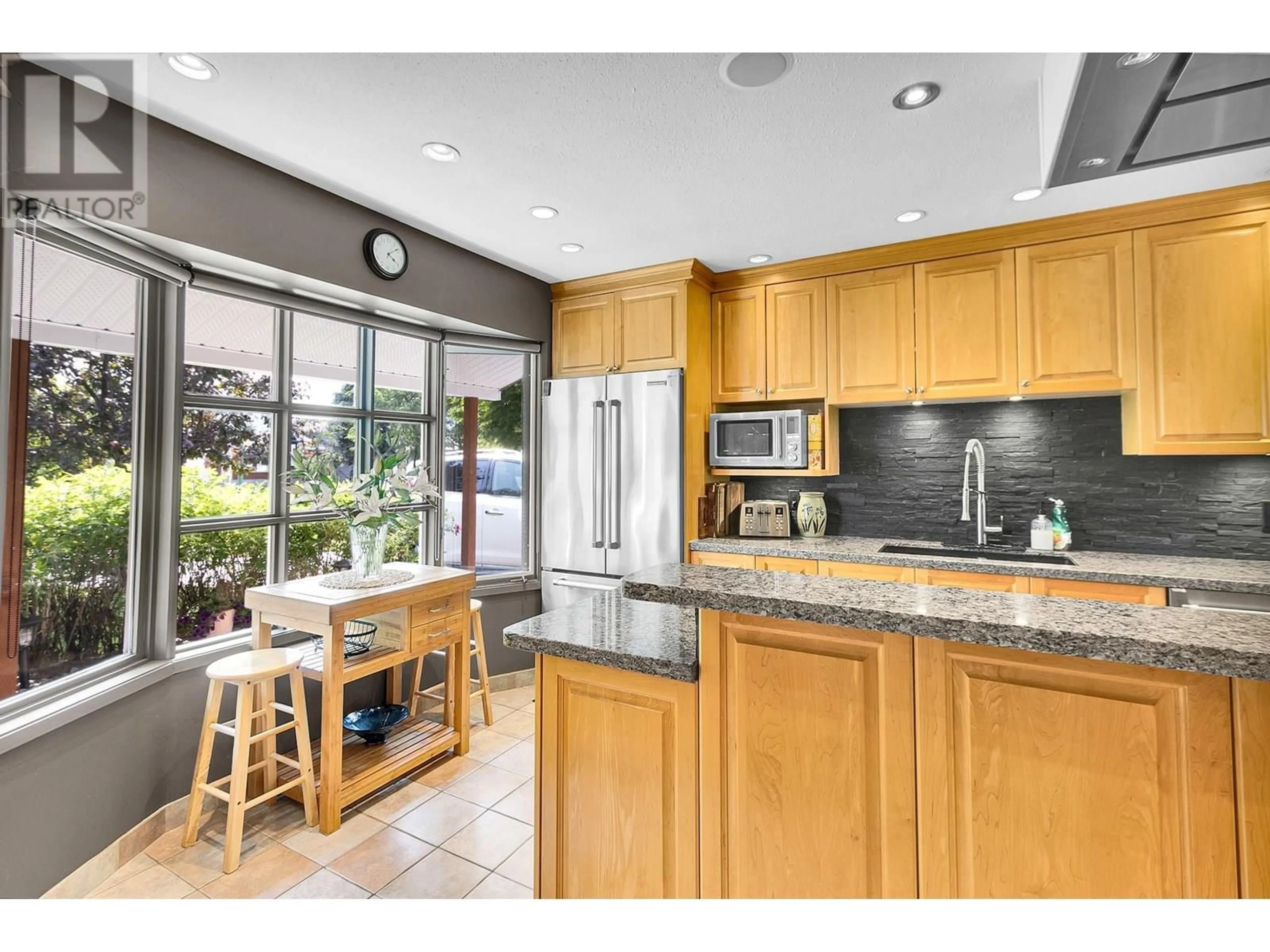 Open concept kitchen, ceramic/tile floor for 120 KING DRIVE, Prince George British Columbia V2M4V4