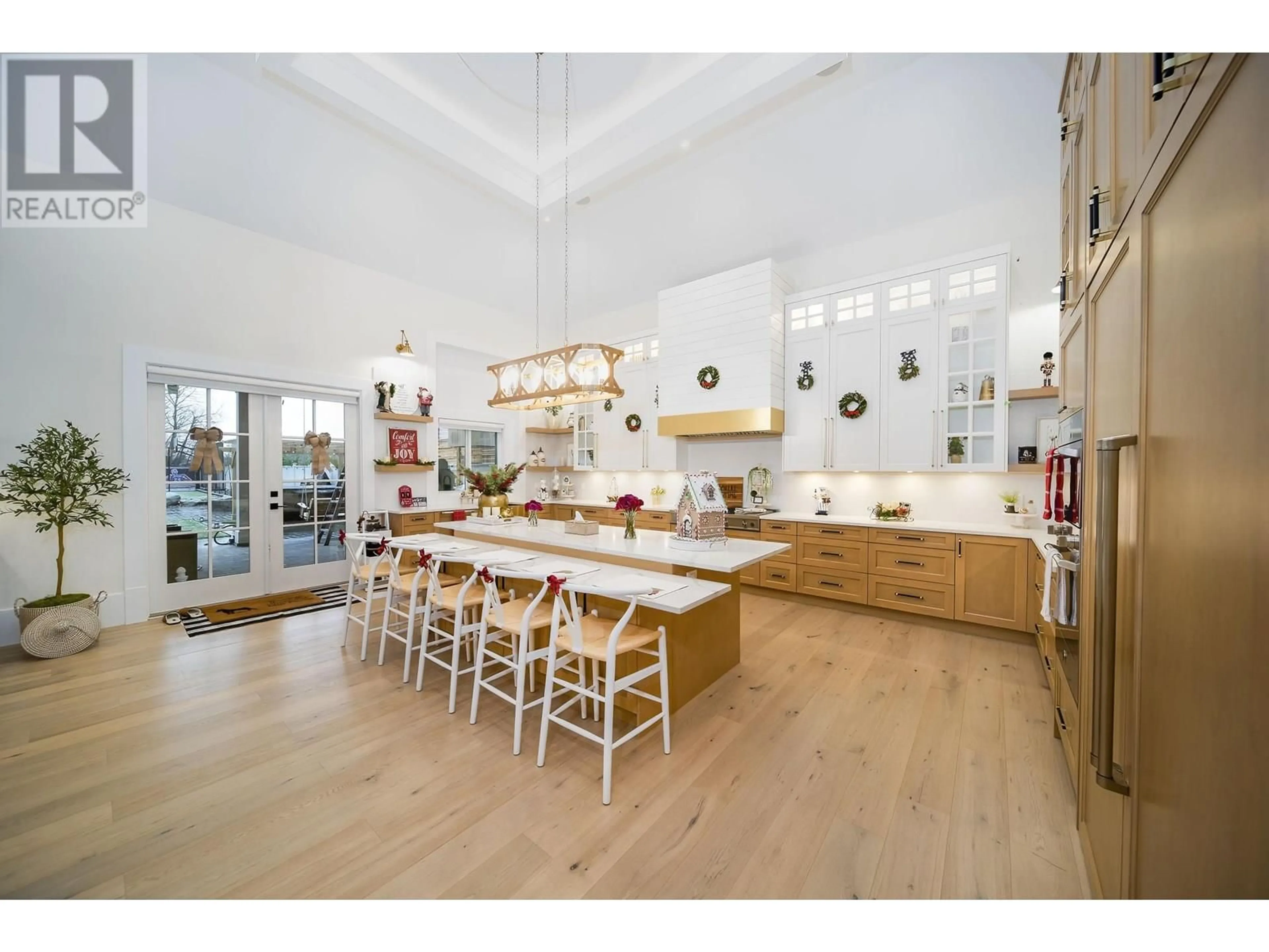 Open concept kitchen, wood/laminate floor for 11566 BLUNDELL ROAD, Richmond British Columbia V6Y1L3