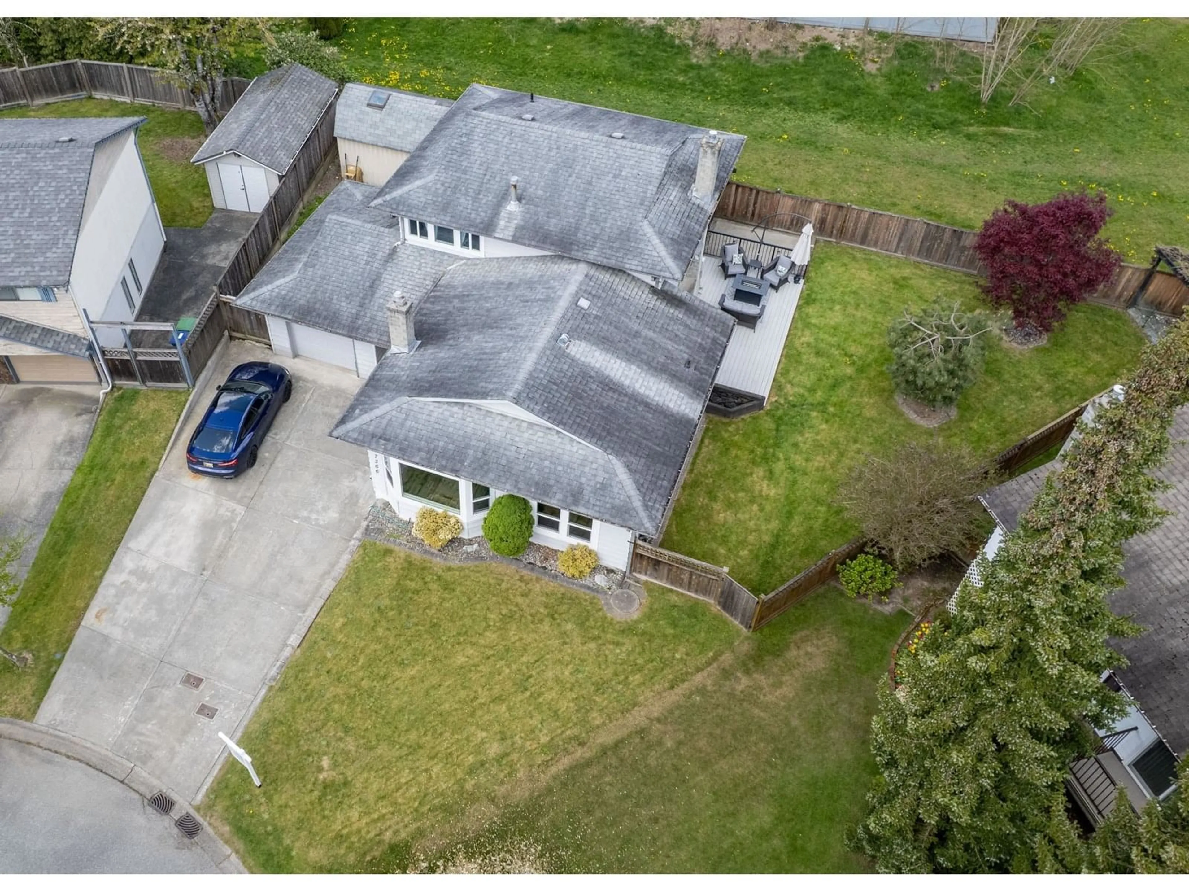 A pic from outside/outdoor area/front of a property/back of a property/a pic from drone, street for 7366 141, Surrey British Columbia V3W7L1