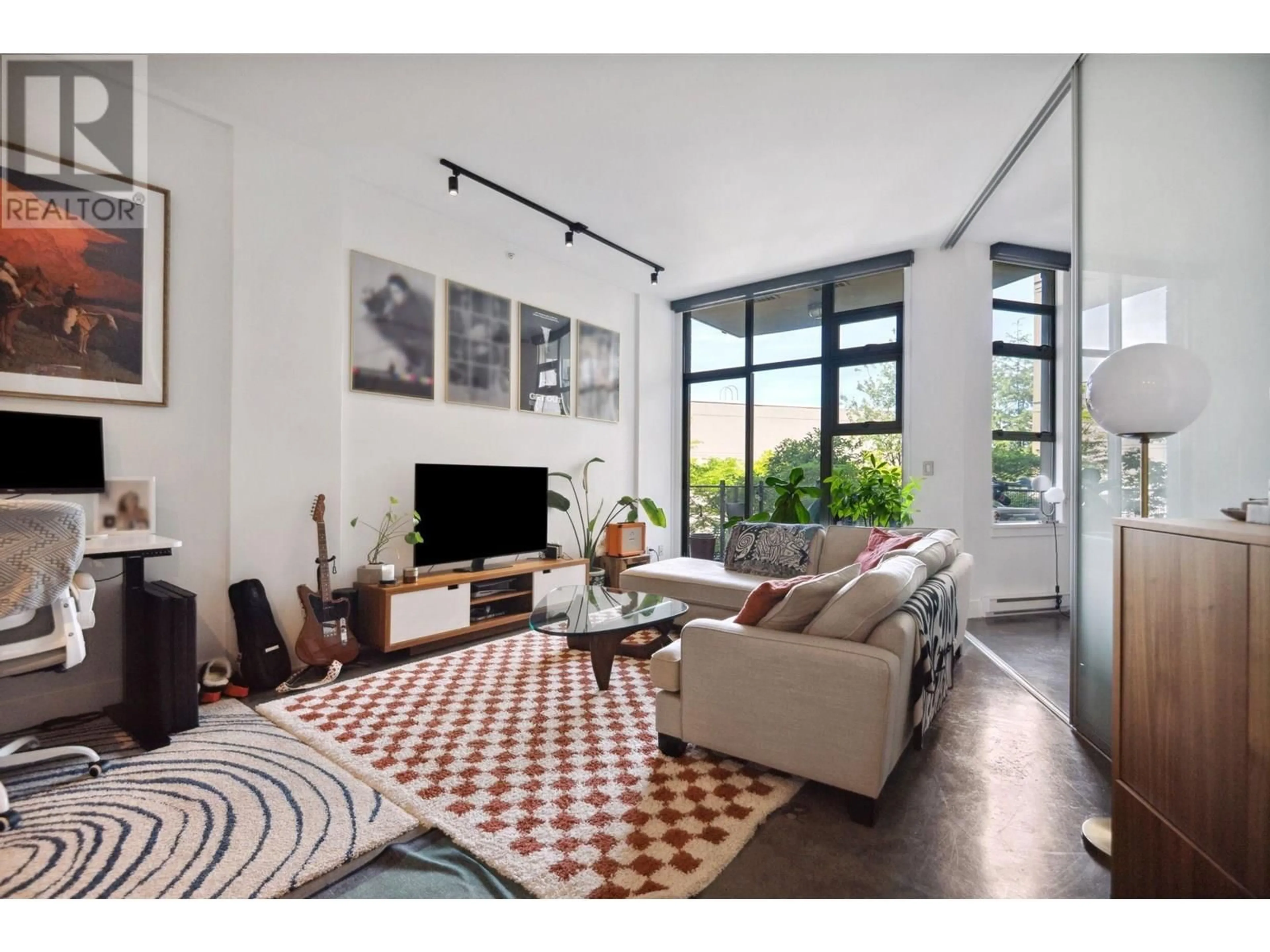 Living room with furniture, unknown for 209 - 2635 PRINCE EDWARD STREET, Vancouver British Columbia V5T4V7