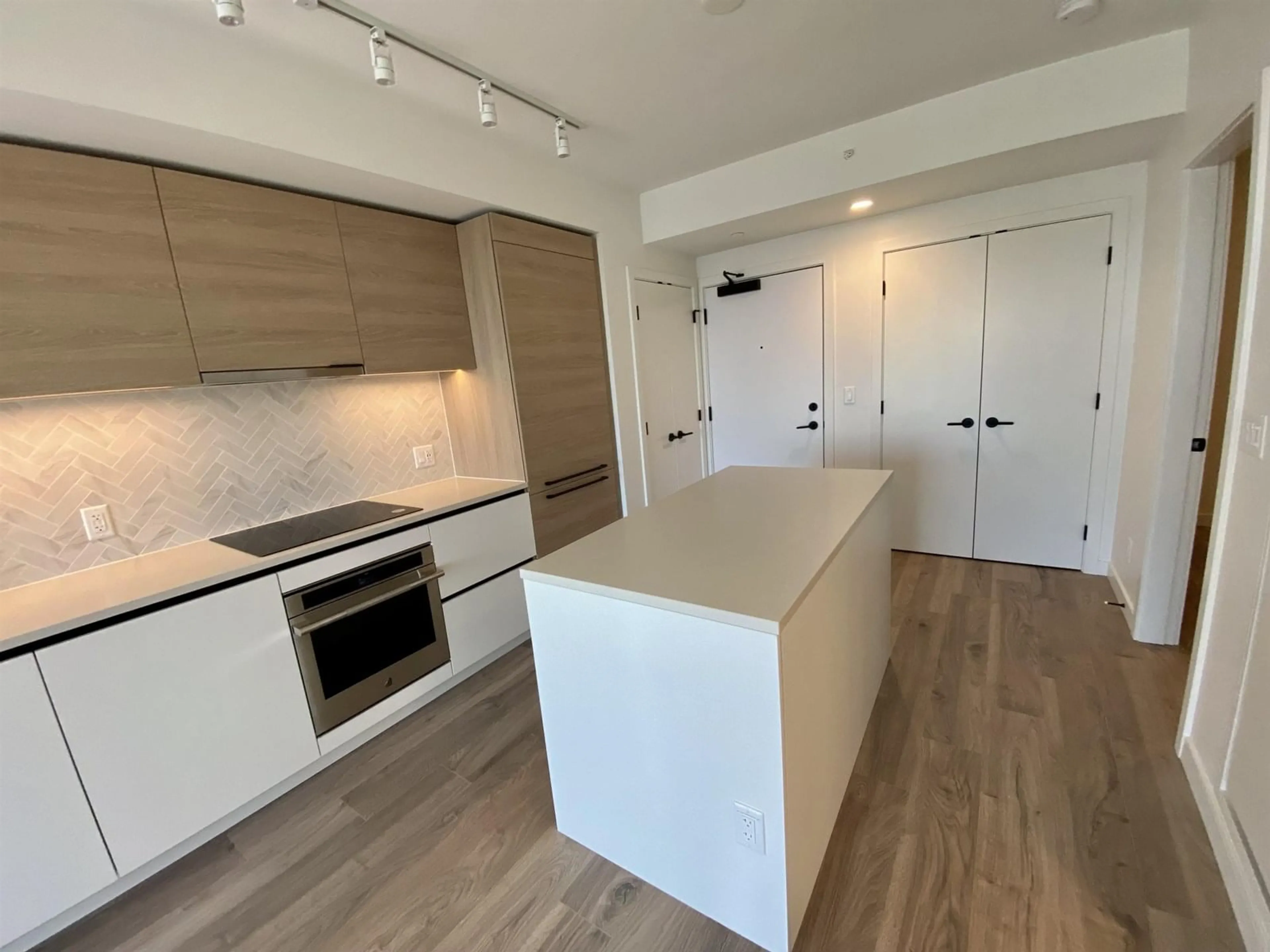 Open concept kitchen, unknown for 1801 - 13428 105, Surrey British Columbia V3T0S6