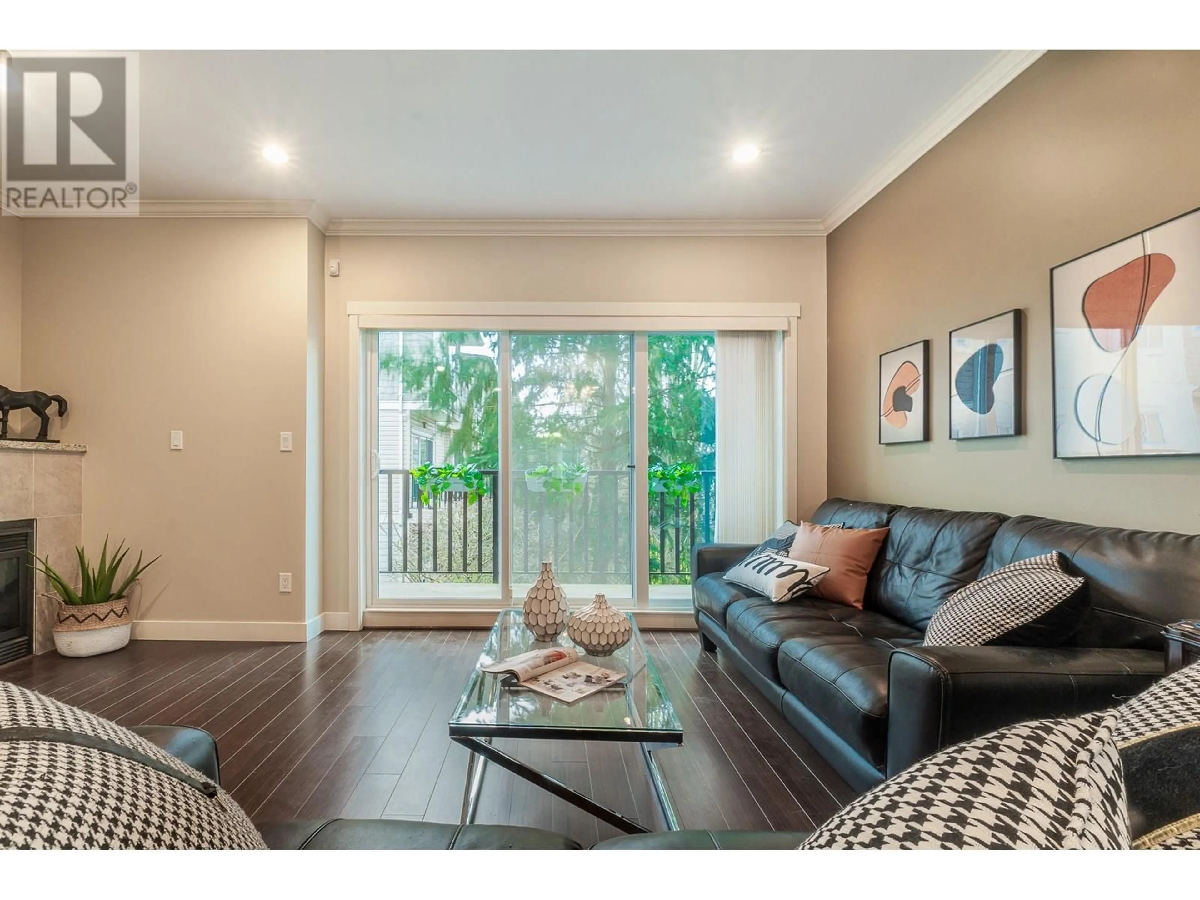 Living room with furniture, wood/laminate floor for 31 - 7051 ASH STREET, Richmond British Columbia V6Y2R9