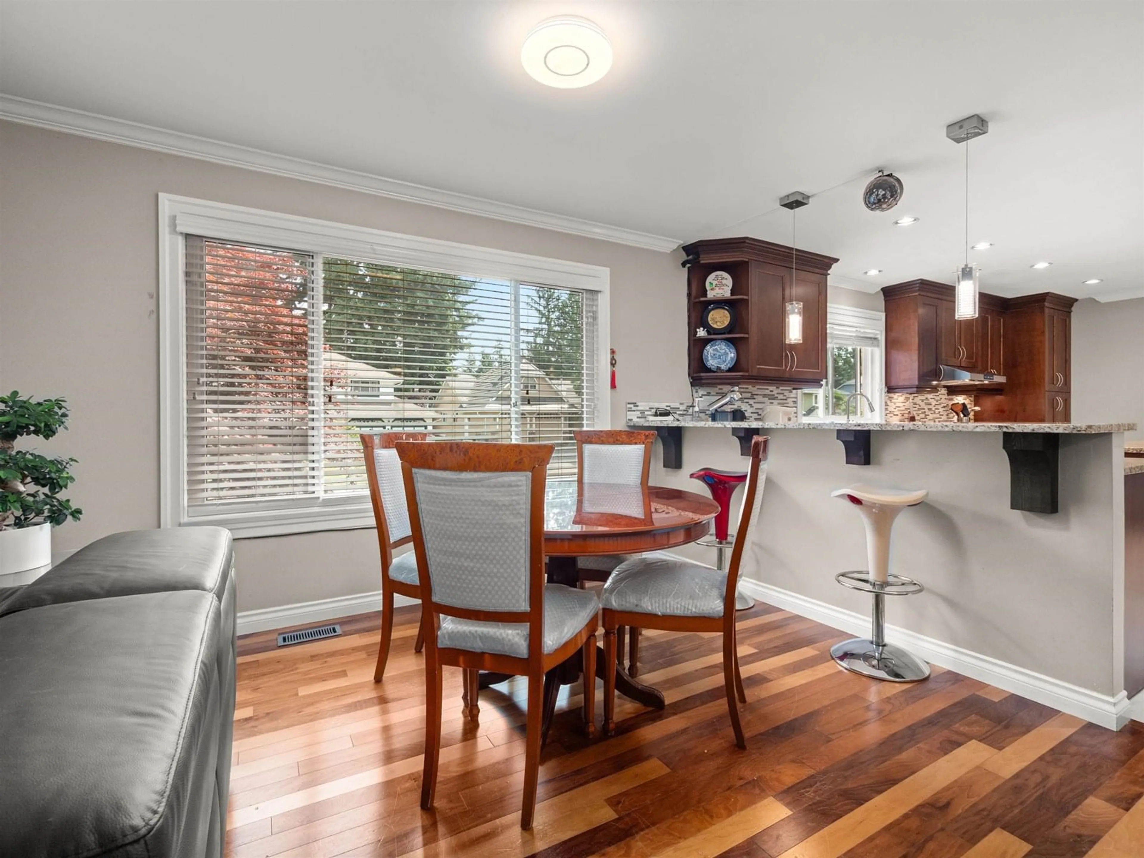 Open concept kitchen, wood/laminate floor for 10733 DUNLOP, Delta British Columbia V4C2M7
