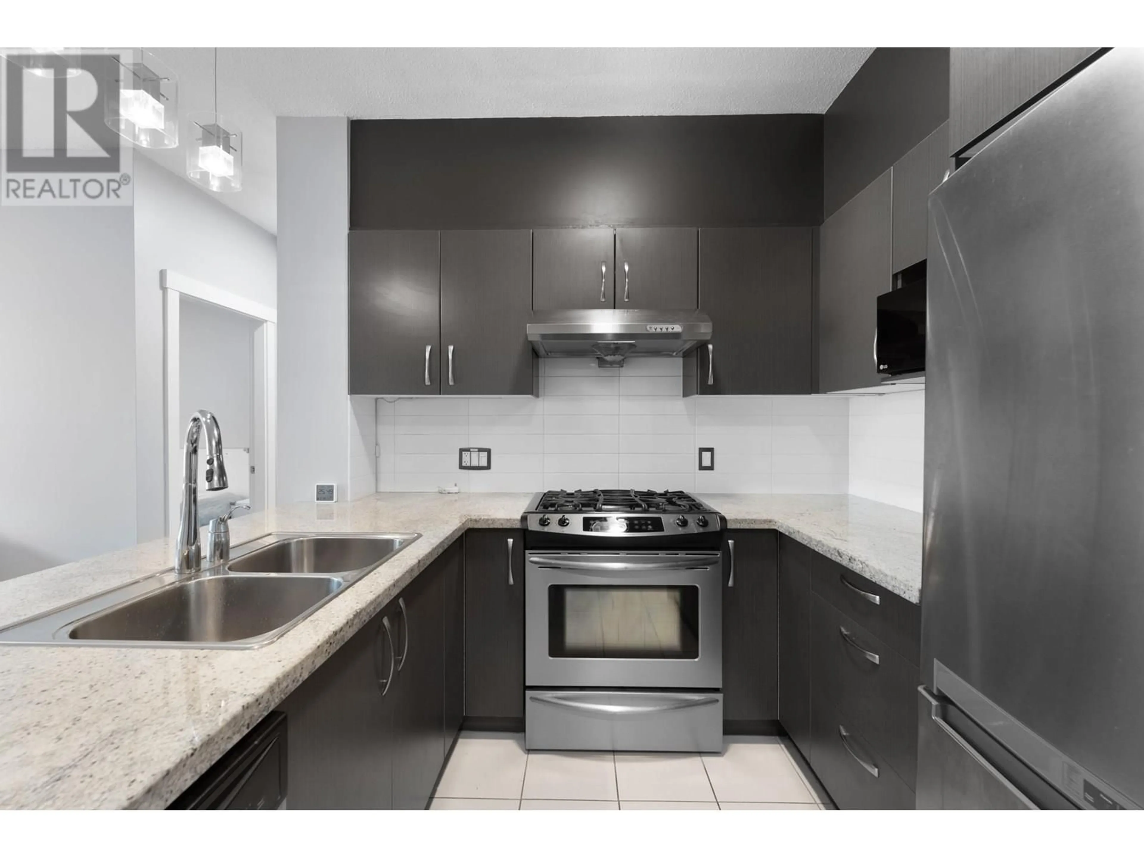 Standard kitchen, ceramic/tile floor for 412 - 9299 TOMICKI AVENUE, Richmond British Columbia V6X0C5