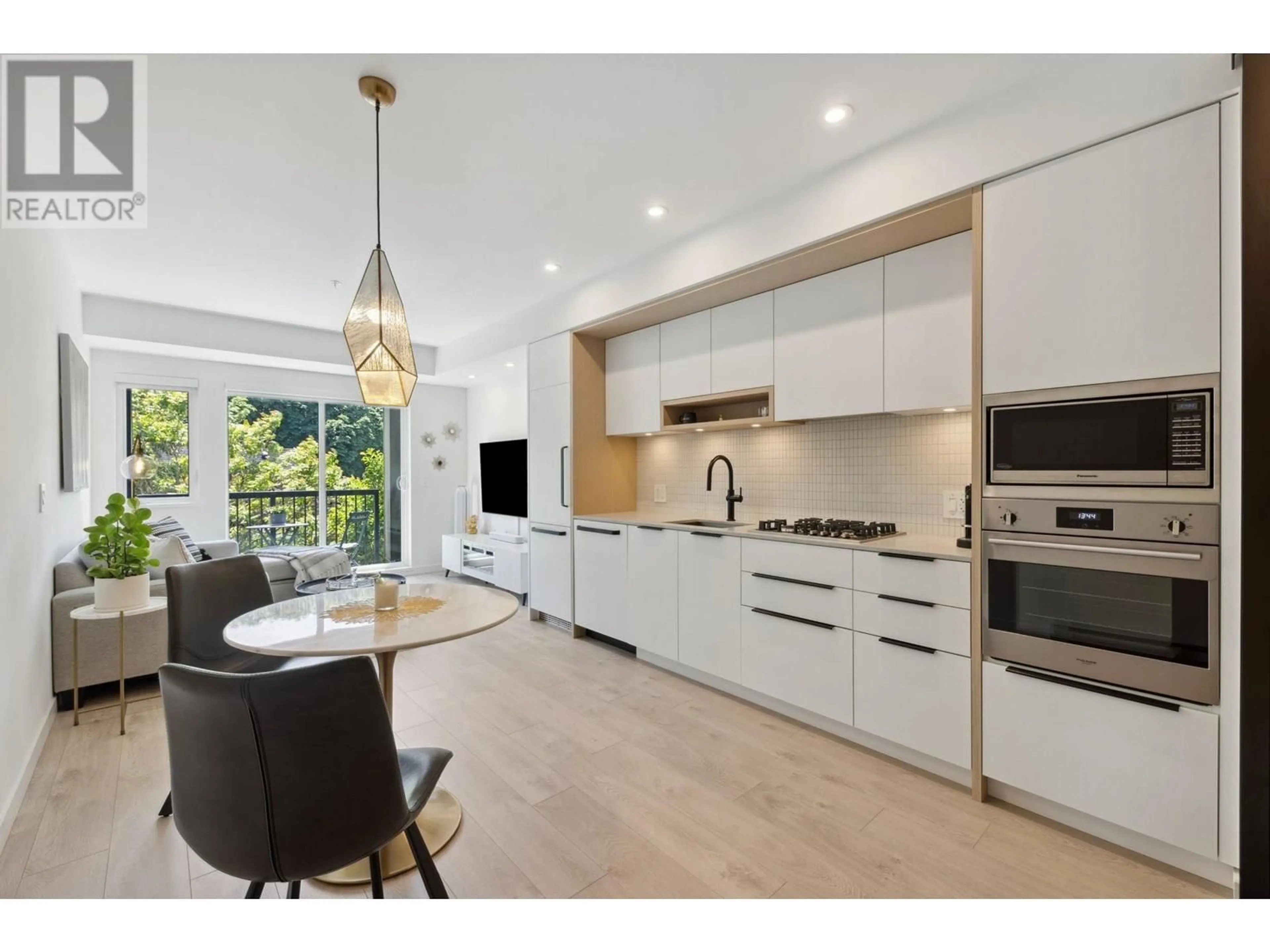 Open concept kitchen, unknown for 316 - 2520 GUELPH STREET, Vancouver British Columbia V5T0K7