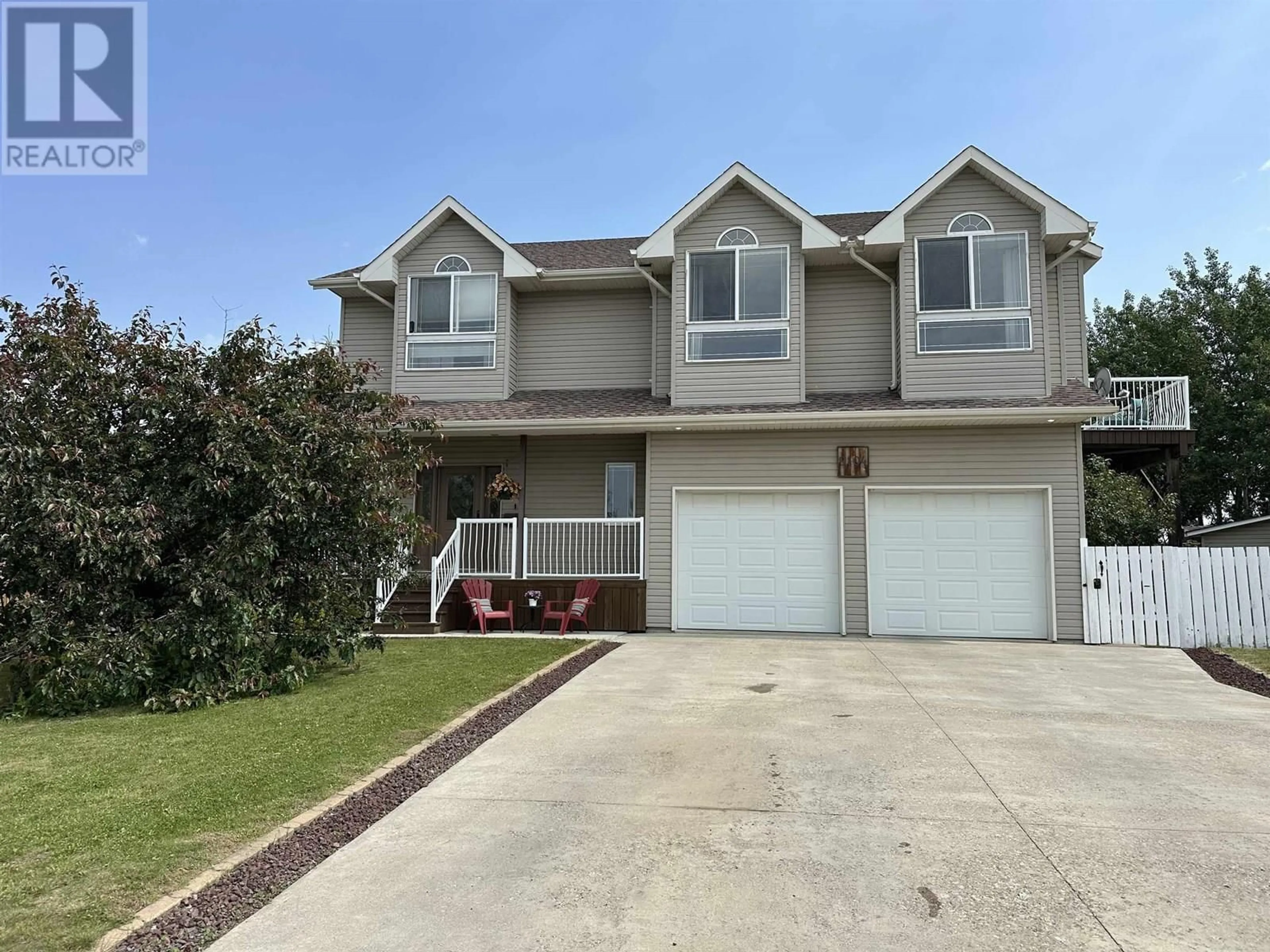 Home with vinyl exterior material, street for 9104 109 AVENUE, Fort St. John British Columbia V1J7A8