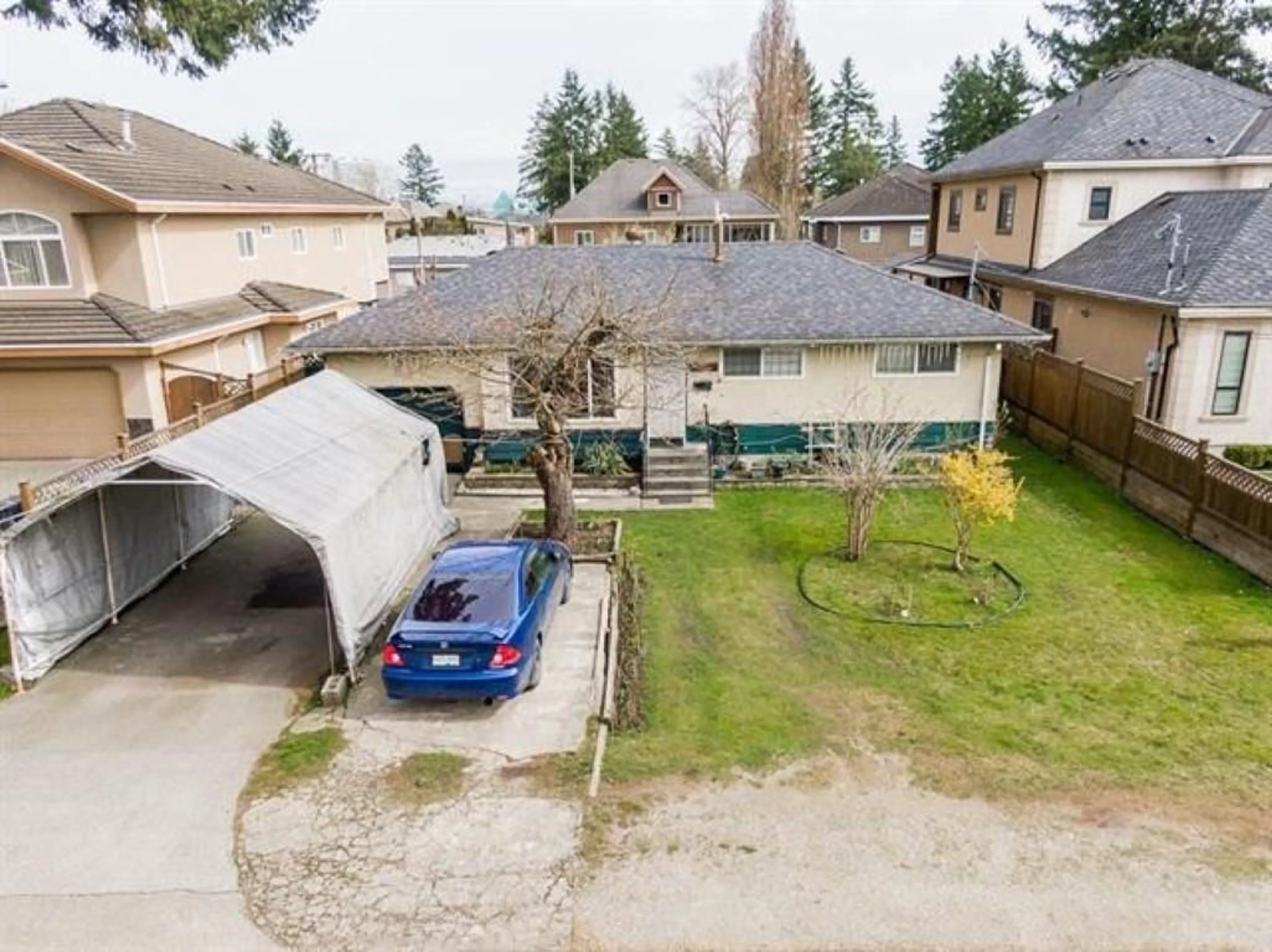 A pic from outside/outdoor area/front of a property/back of a property/a pic from drone, street for 10286 148A, Surrey British Columbia V3R3Z2