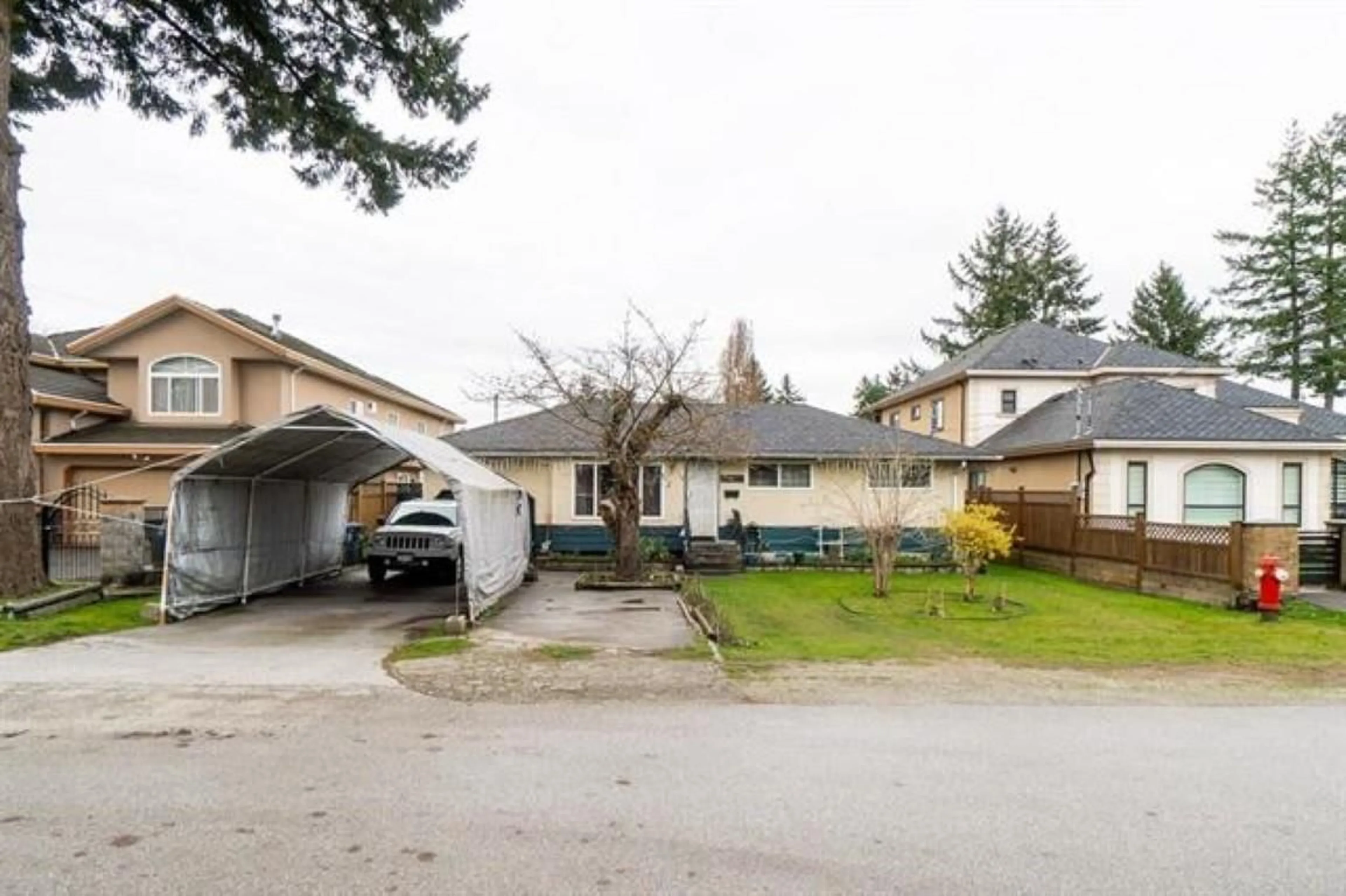 A pic from outside/outdoor area/front of a property/back of a property/a pic from drone, street for 10286 148A, Surrey British Columbia V3R3Z2