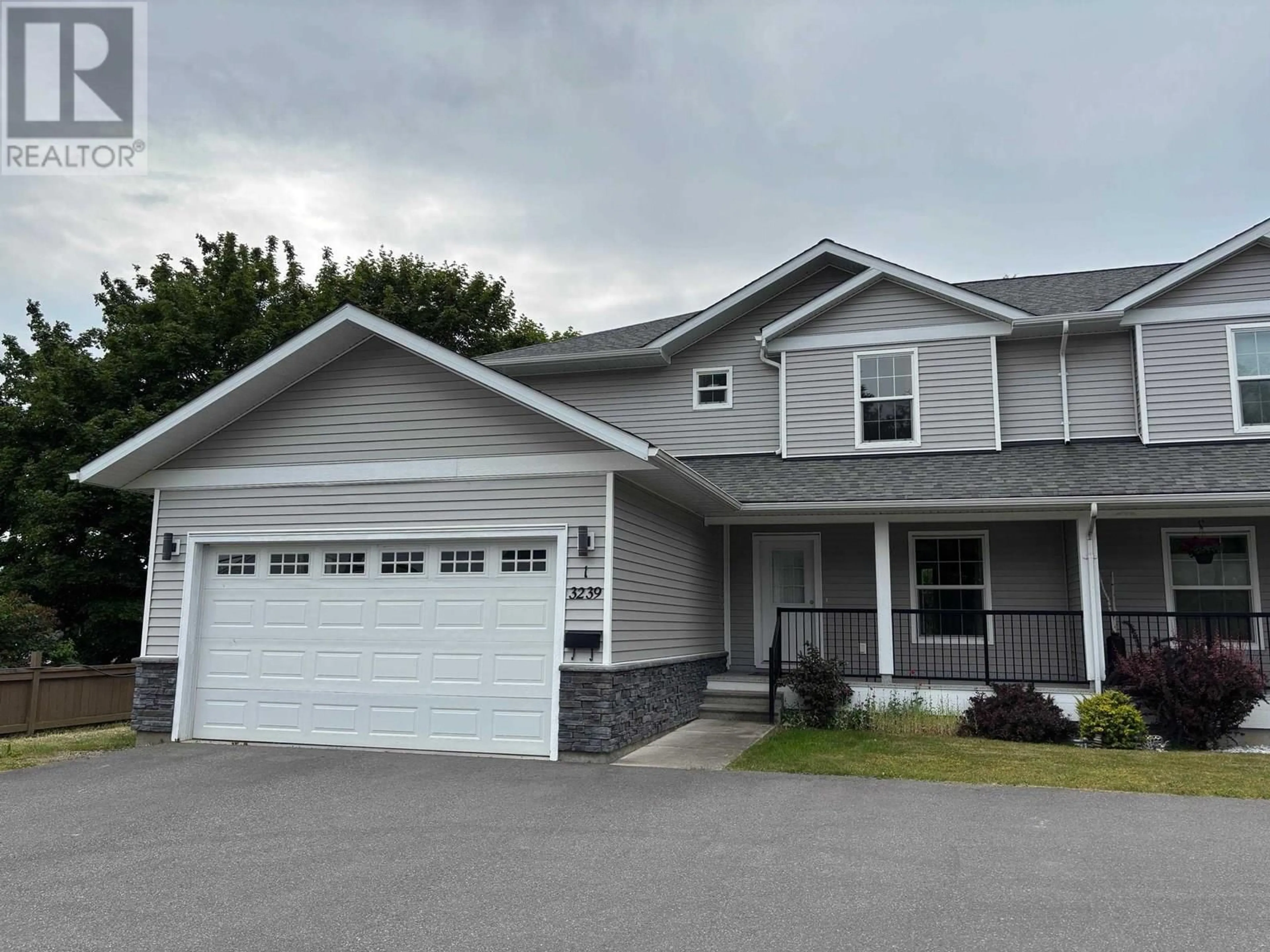 Home with vinyl exterior material, street for 1 - 3239 APSLEY STREET, Terrace British Columbia V8G0J5