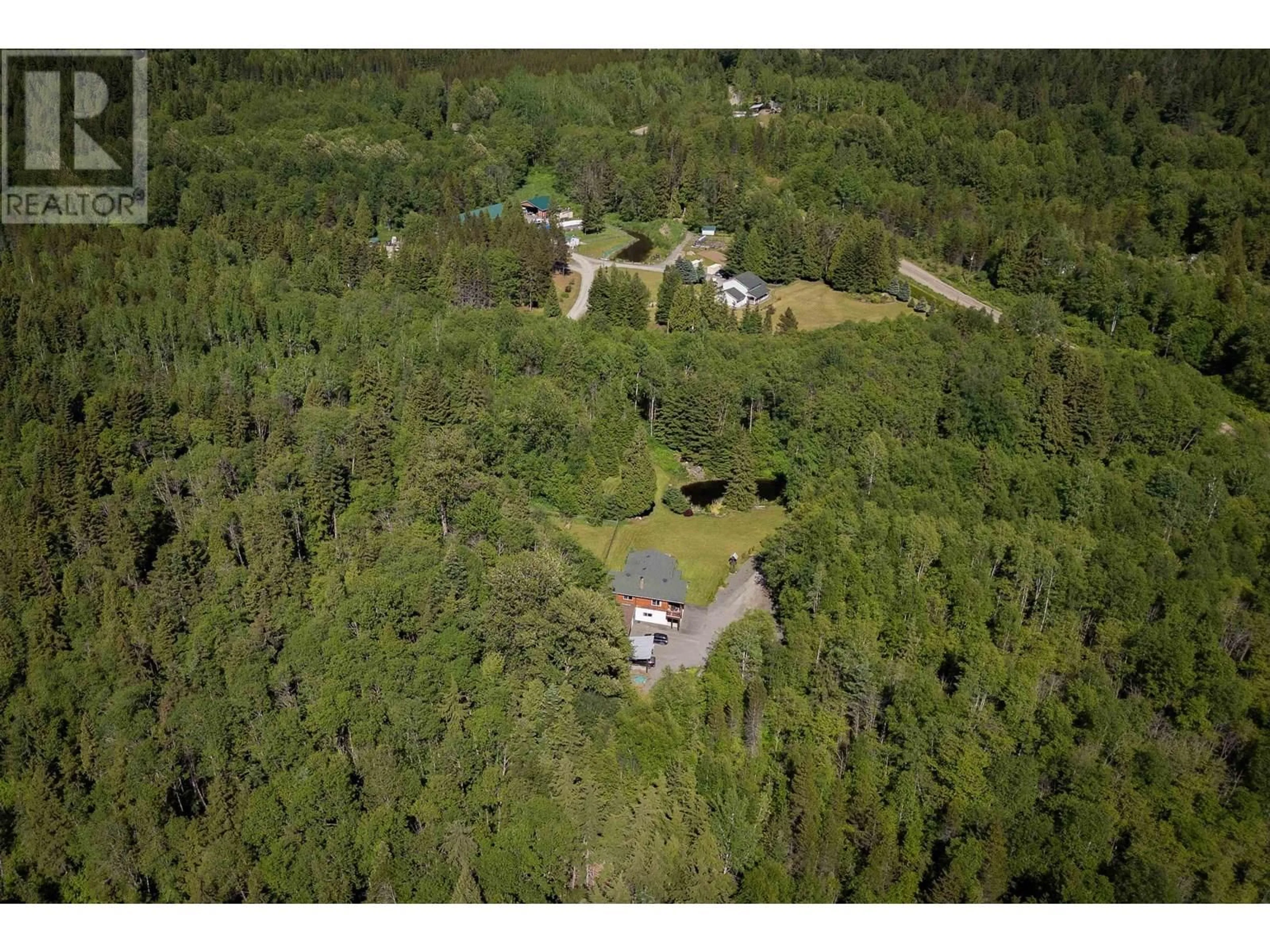 A pic from outside/outdoor area/front of a property/back of a property/a pic from drone, forest/trees view for 5255 DEEP CREEK DRIVE, Terrace British Columbia V8G0C2