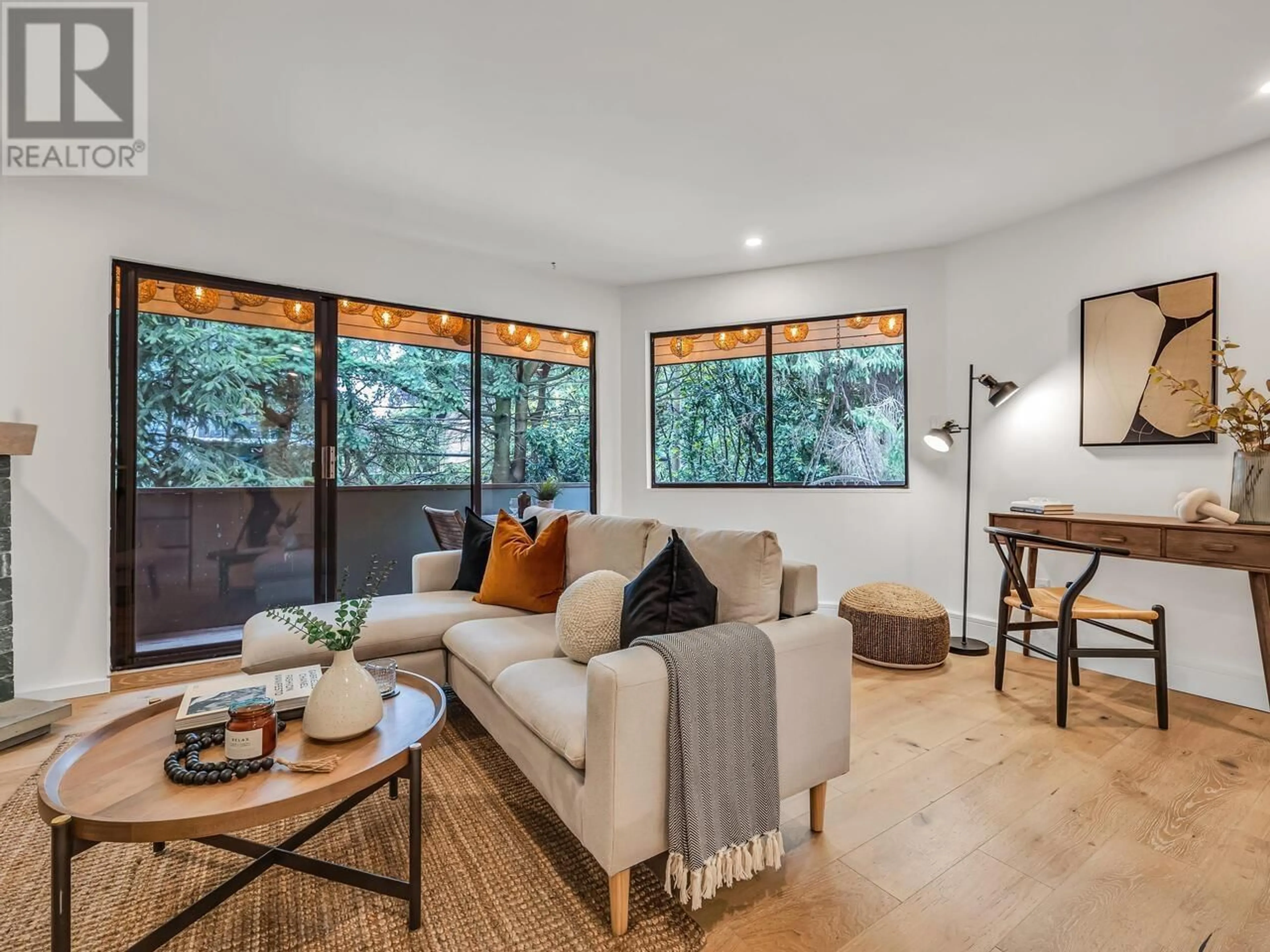 Living room with furniture, wood/laminate floor for 301 - 350 5TH AVENUE, Vancouver British Columbia V5T1H4