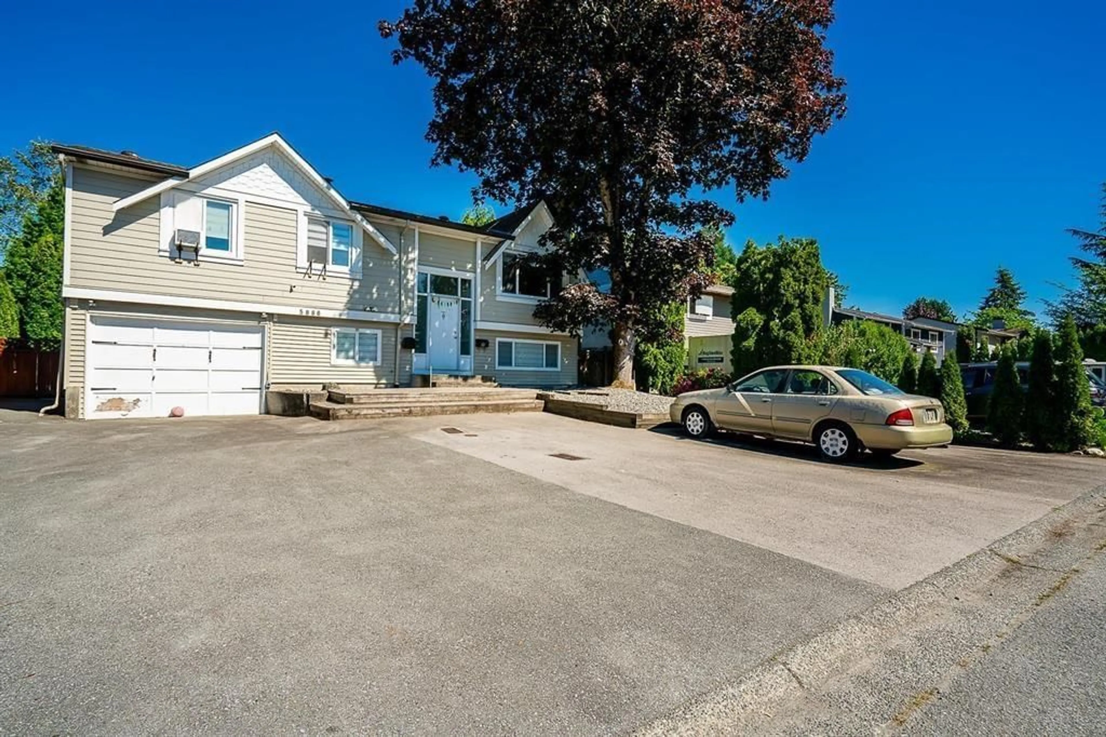 A pic from outside/outdoor area/front of a property/back of a property/a pic from drone, street for 5886 184A, Surrey British Columbia V3S5S7