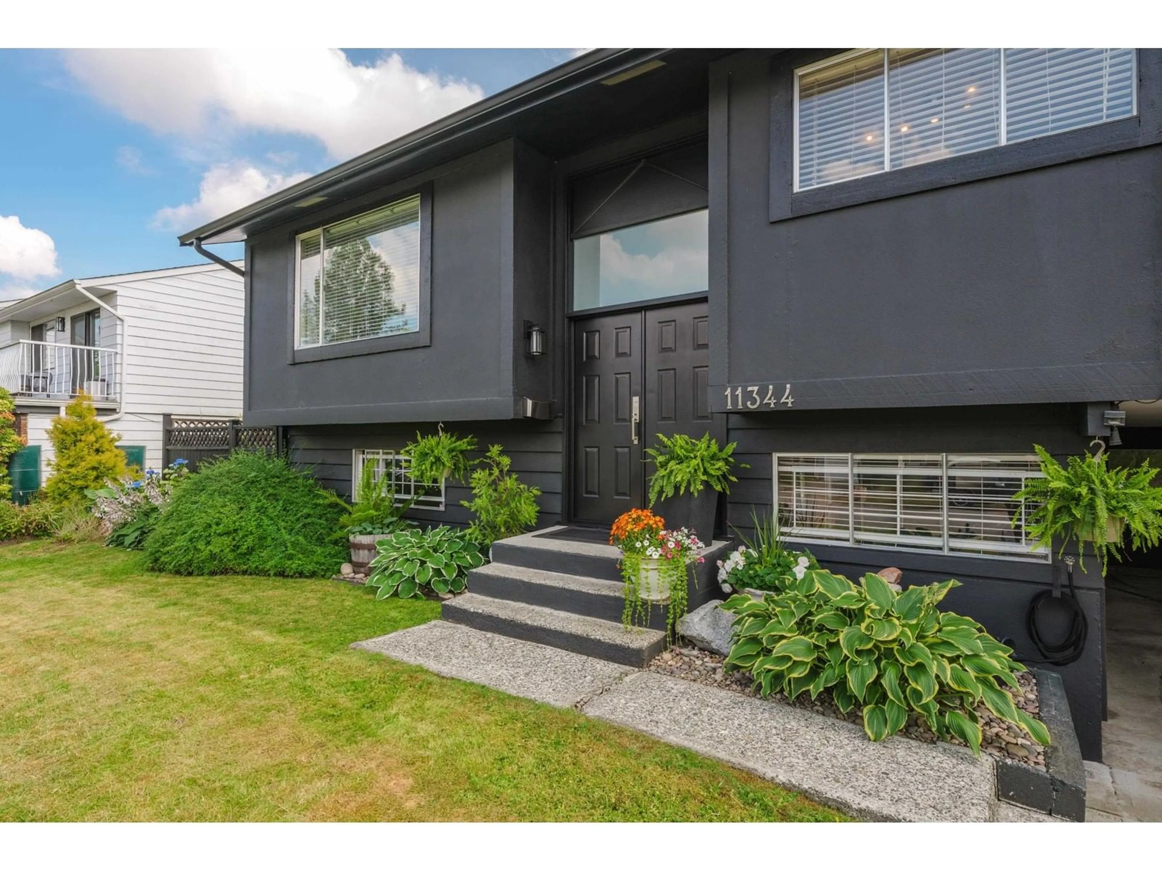 Home with vinyl exterior material, street for 11344 86A, Delta British Columbia V4C2Y8