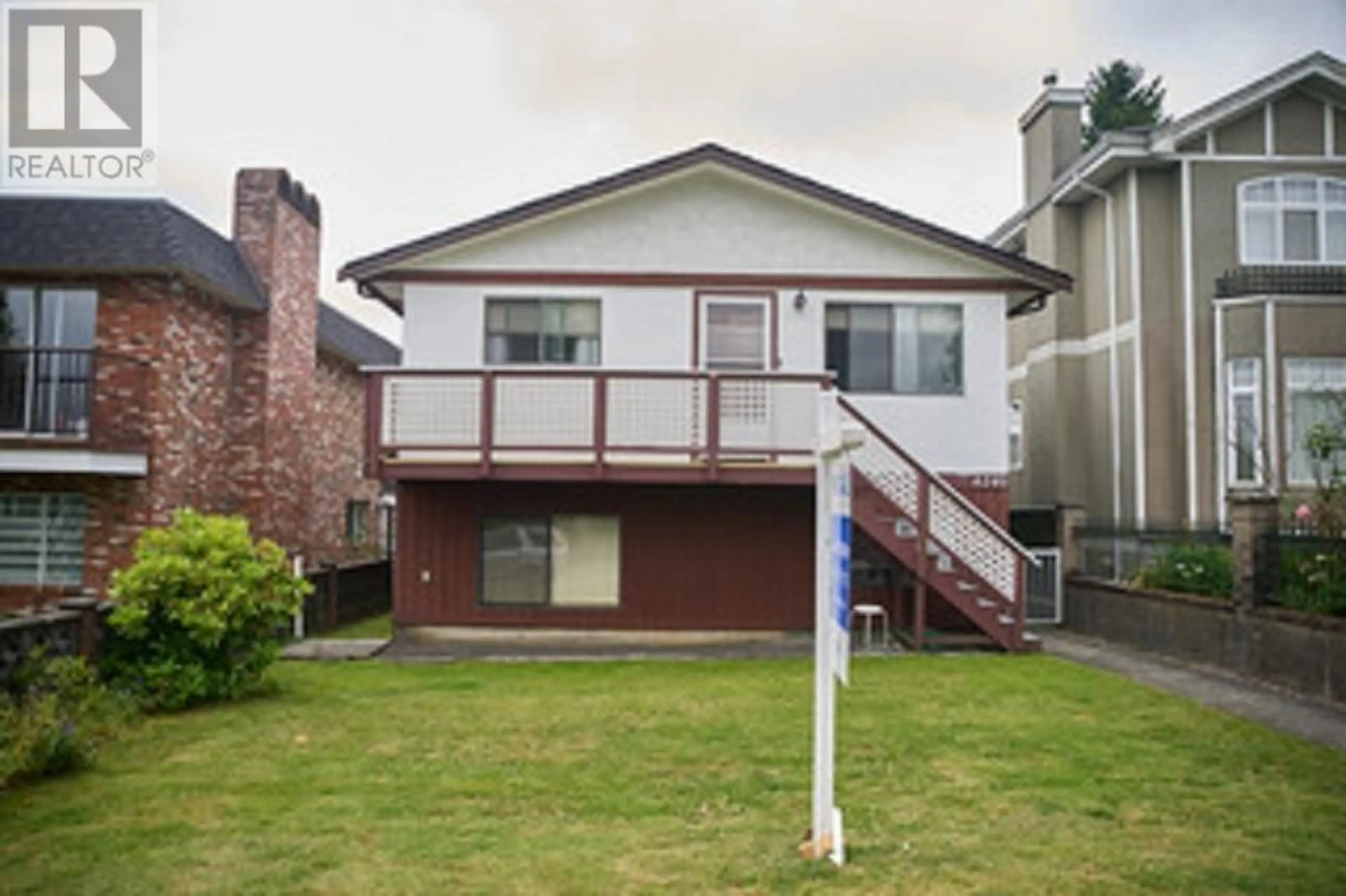 Home with vinyl exterior material, street for 4240 DUNDAS STREET, Burnaby British Columbia V5C1B1