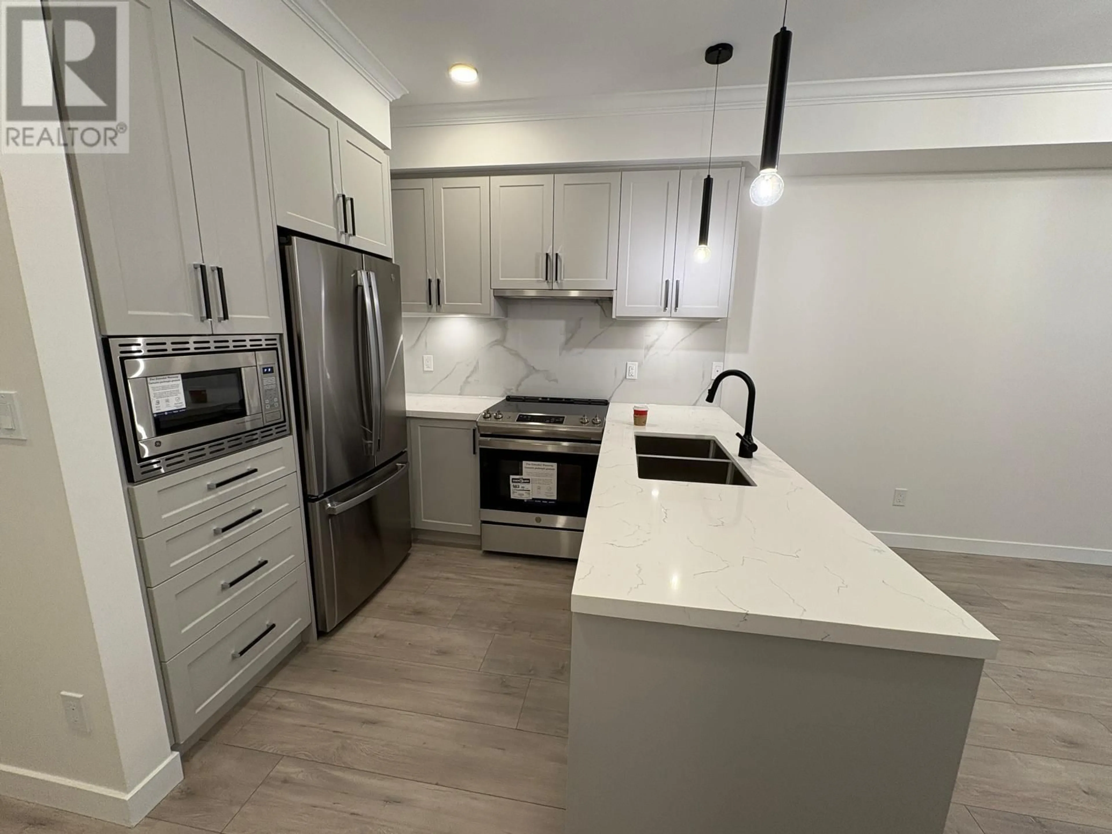 Open concept kitchen, unknown for 208 - 12109 223 STREET, Maple Ridge British Columbia V2X5Y6