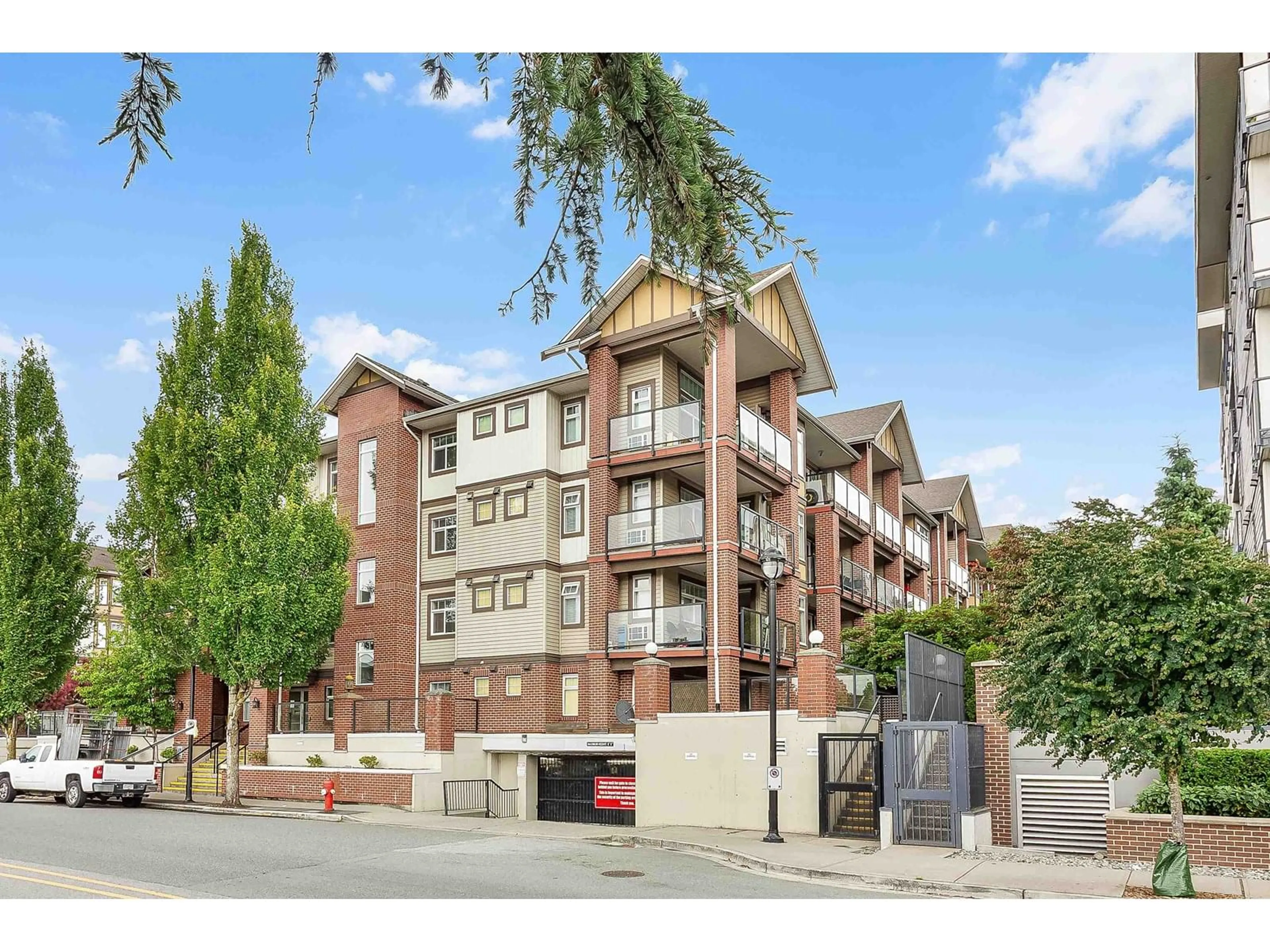 A pic from outside/outdoor area/front of a property/back of a property/a pic from drone, street for 310 - 5650 201A, Langley British Columbia V3A0B3