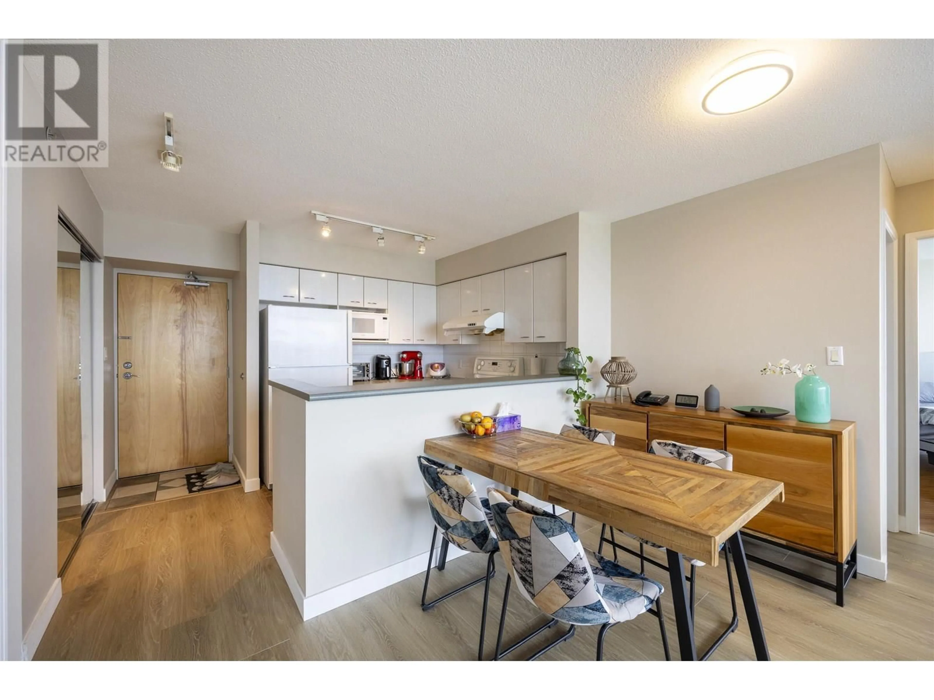 Open concept kitchen, wood/laminate floor for 2905 - 6088 WILLINGDON AVENUE, Burnaby British Columbia V5H4V2