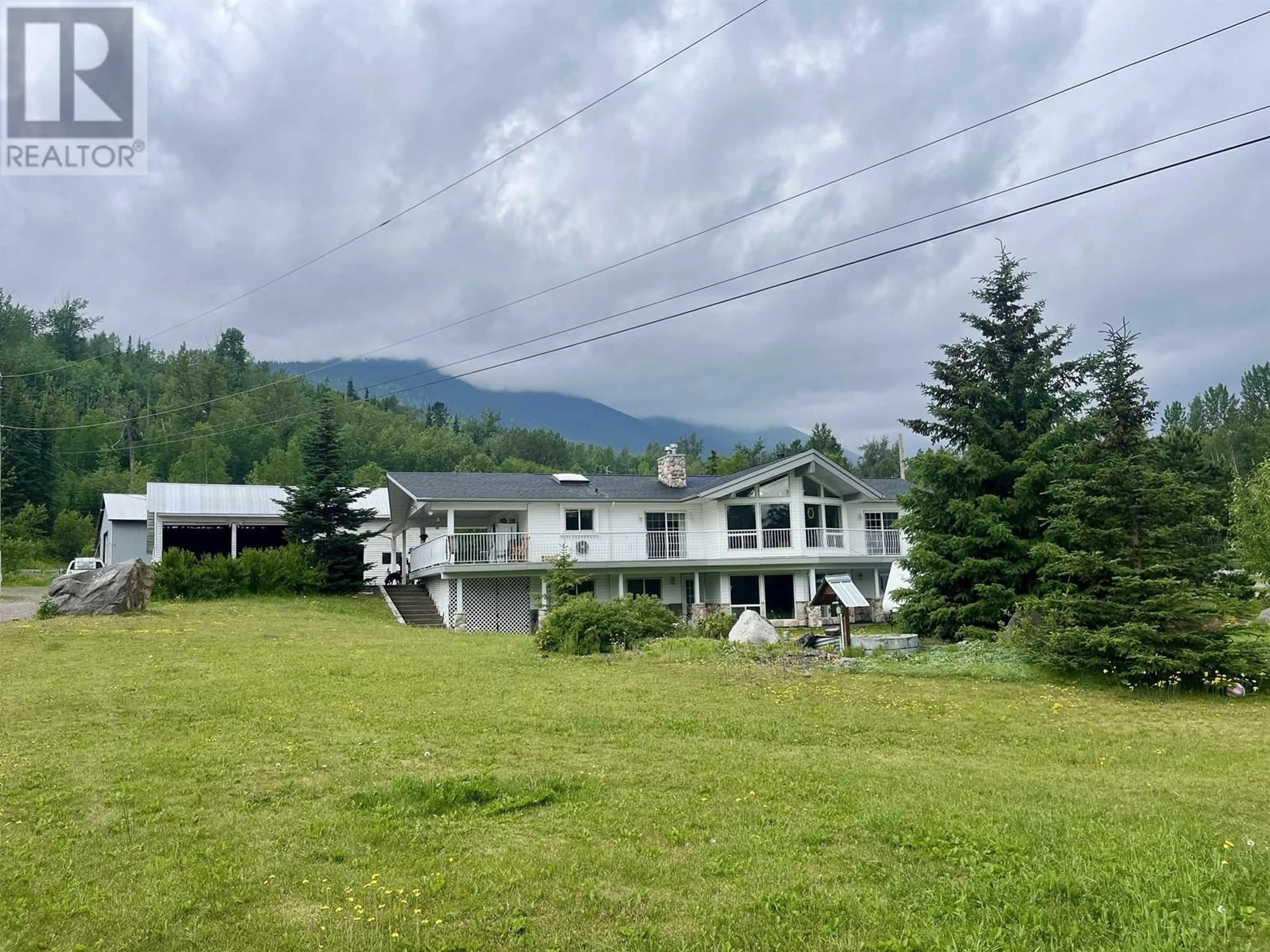 A pic from outside/outdoor area/front of a property/back of a property/a pic from drone, mountain view for 2389 BALSAM ROAD, Smithers British Columbia V0J2N2