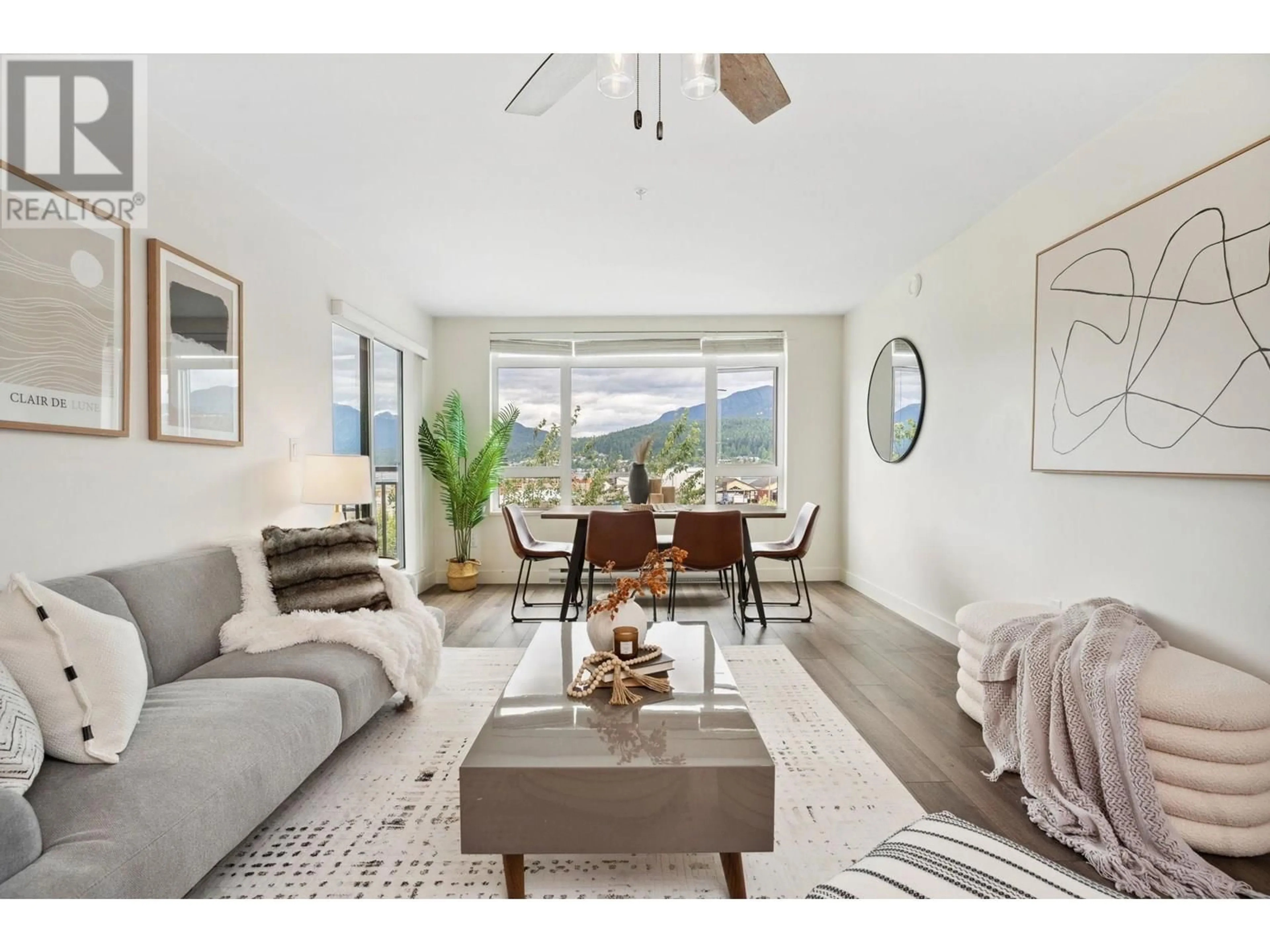 Living room with furniture, unknown for 312 - 2525 CLARKE STREET, Port Moody British Columbia V3H0J3