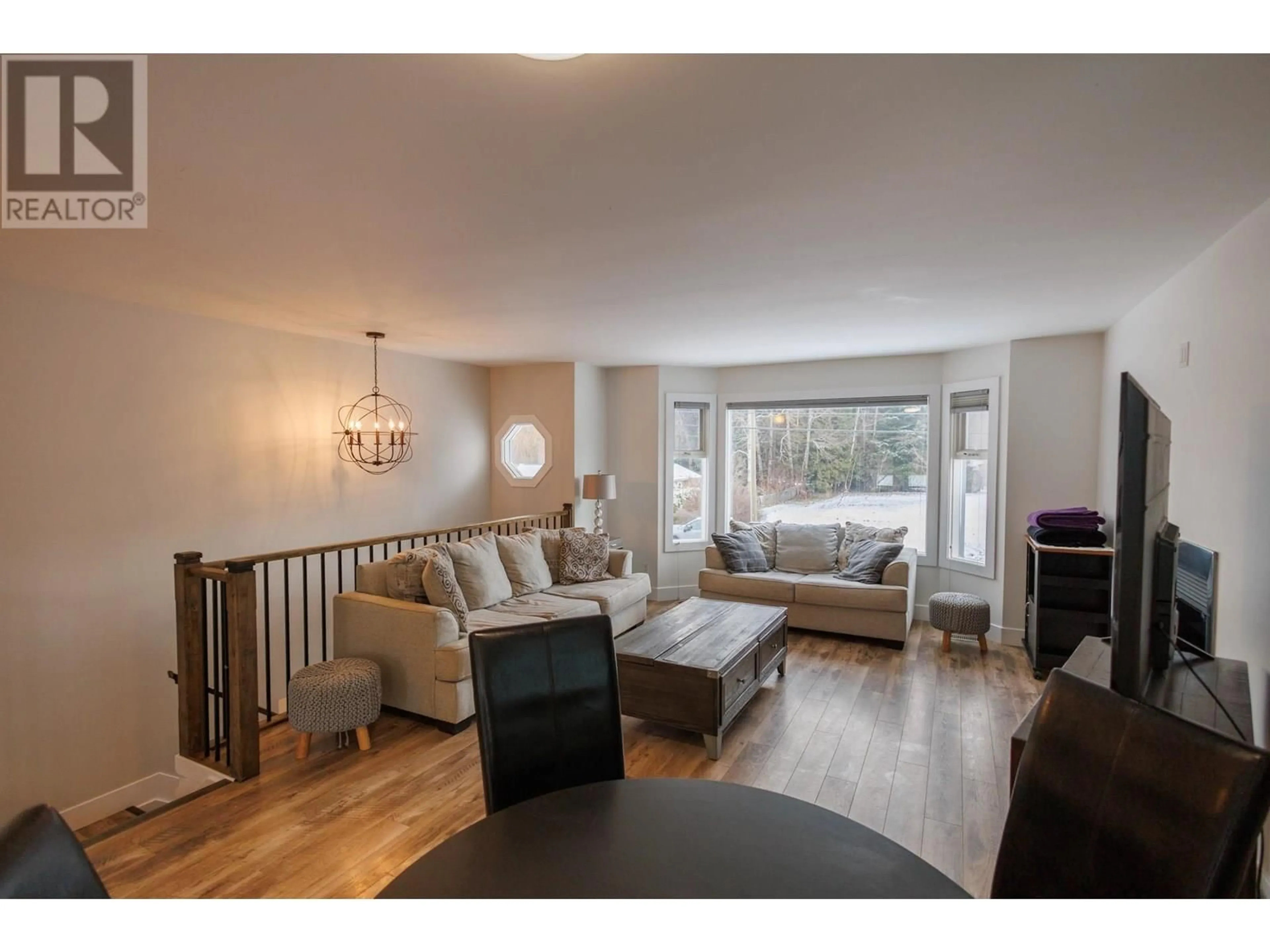 Living room with furniture, wood/laminate floor for 2407 KENNEY STREET, Terrace British Columbia V8G3E2