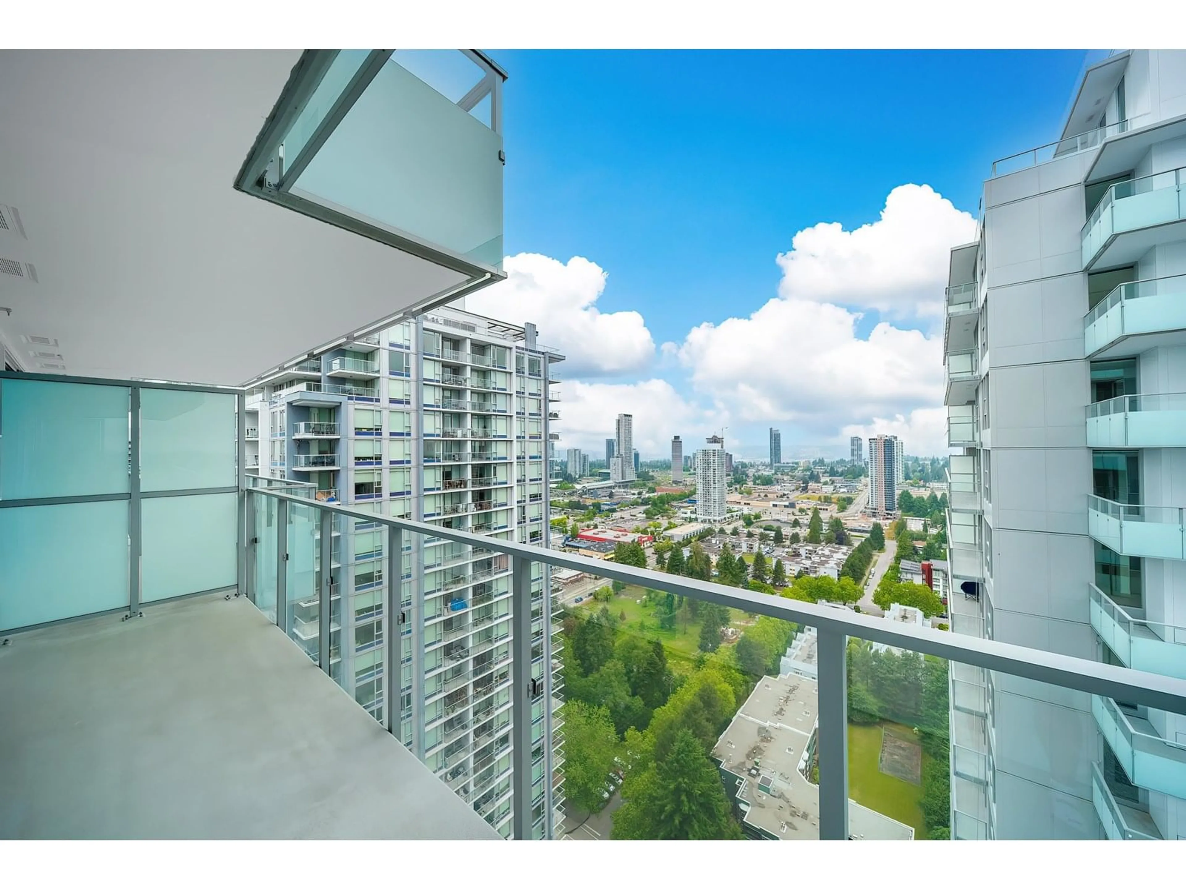 Balcony in the apartment, city buildings view from balcony for 3301 - 13768 100, Surrey British Columbia V3T0V2