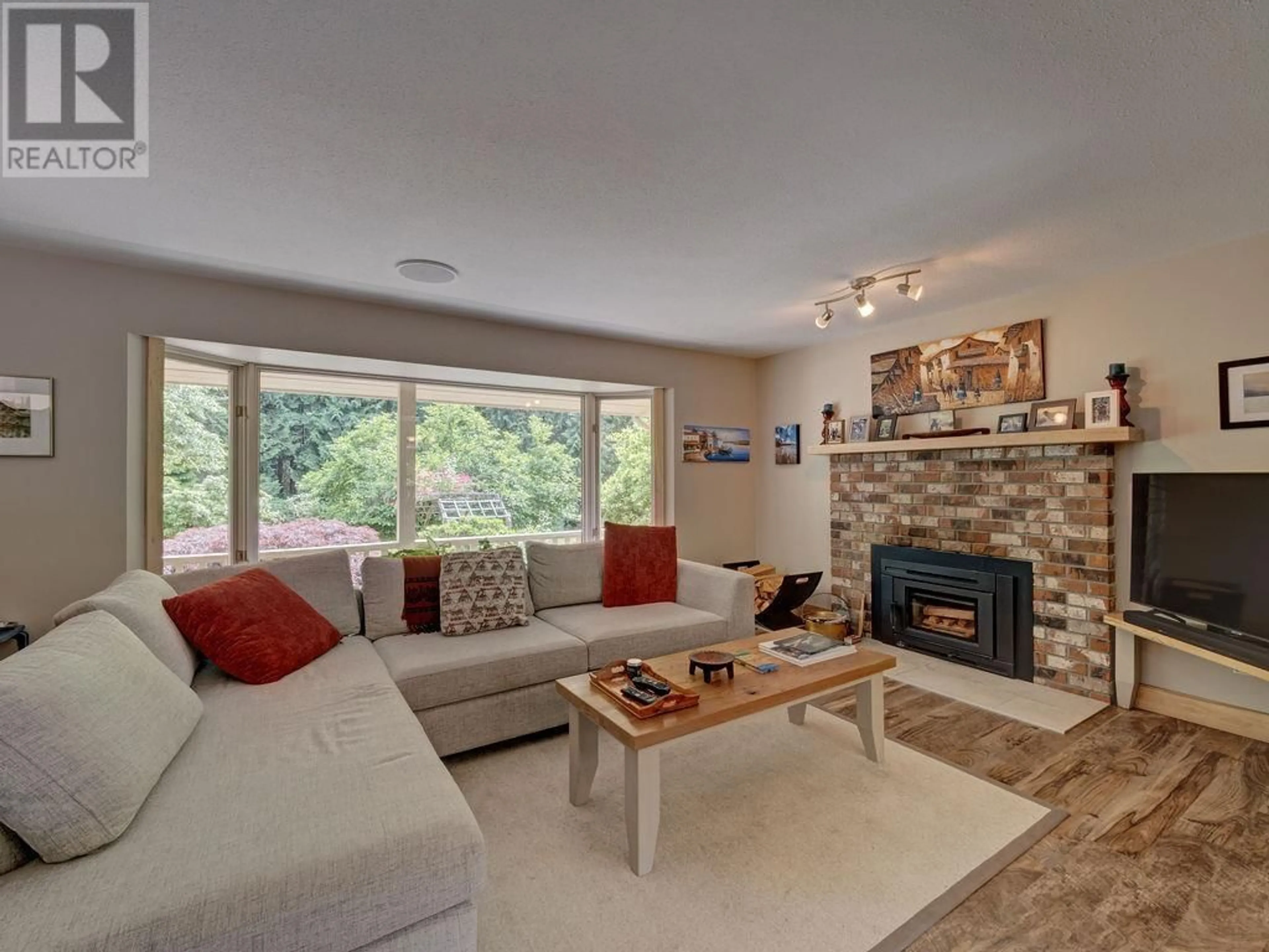 Living room with furniture, unknown for 1317 LOCKYER ROAD, Roberts Creek British Columbia V0N2W1