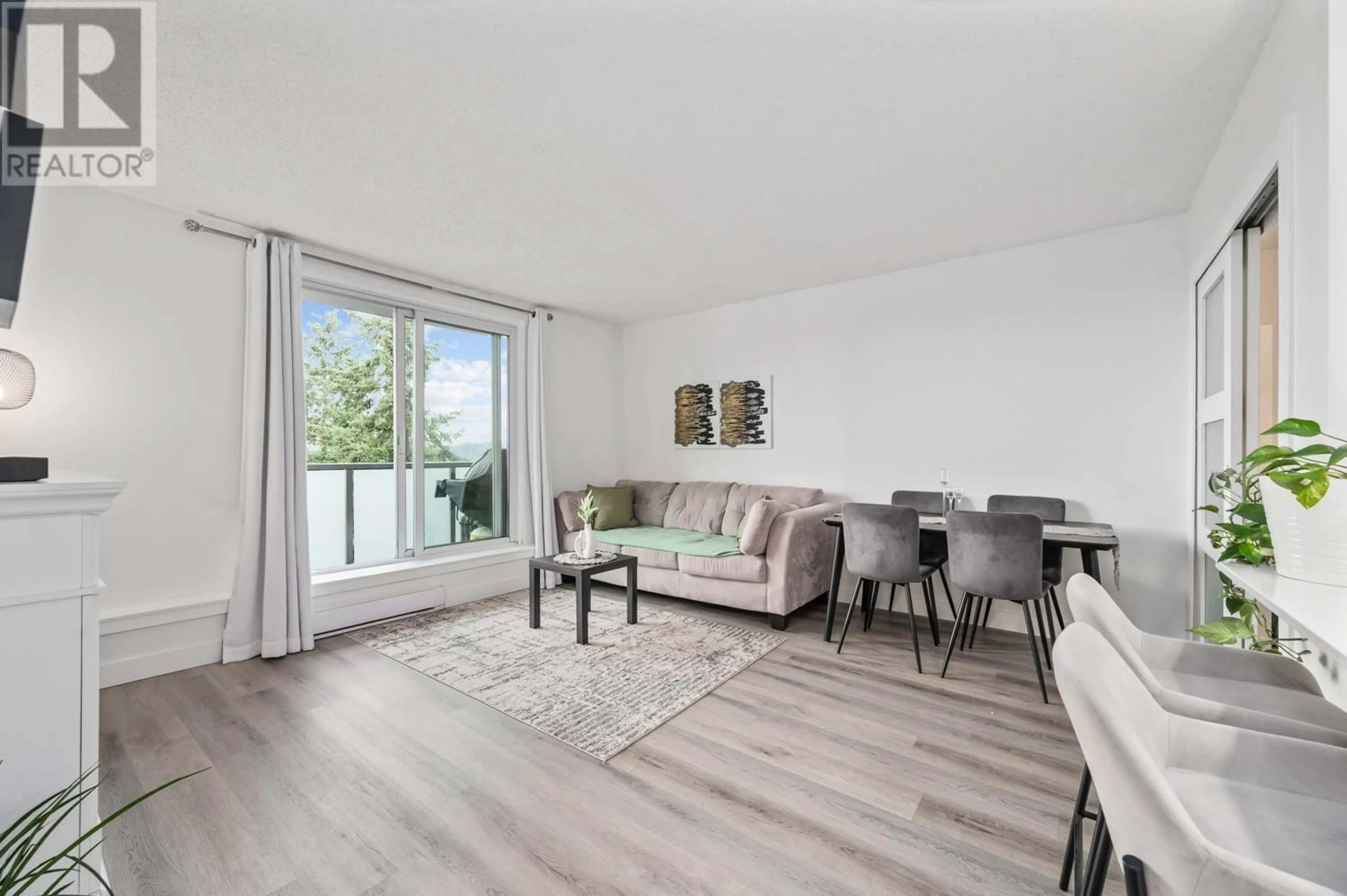 Living room with furniture, wood/laminate floor for 1905 - 9541 ERICKSON DRIVE, Burnaby British Columbia V3J7N8