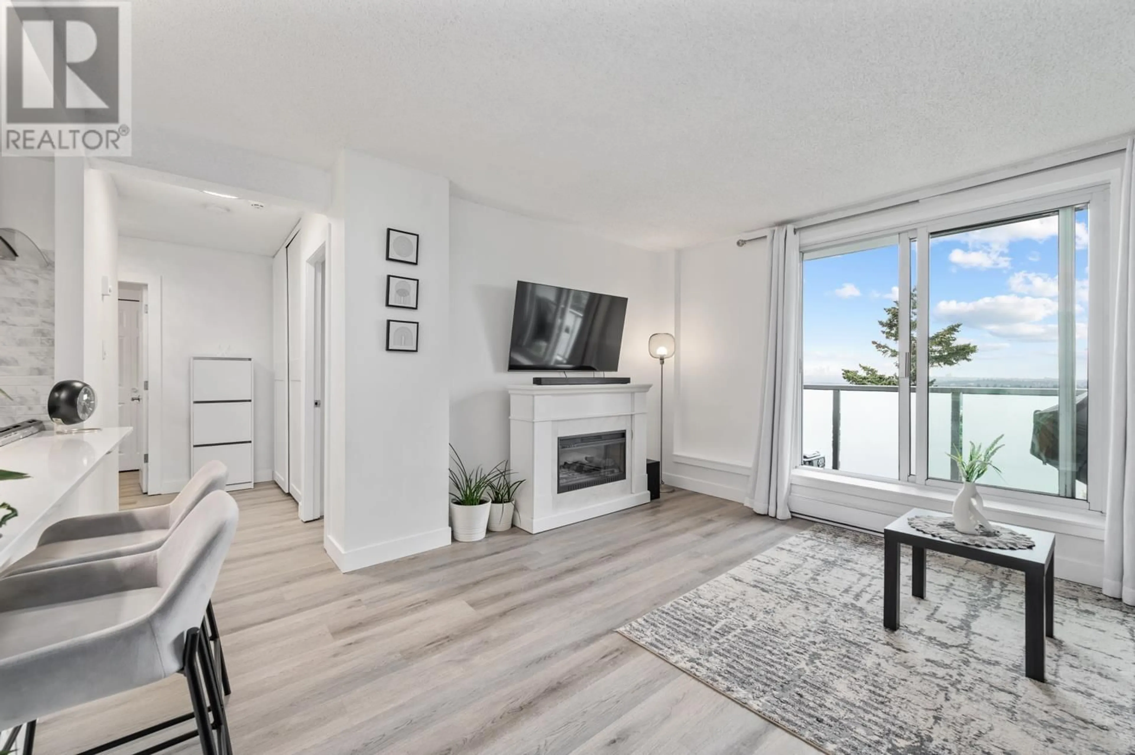 Living room with furniture, wood/laminate floor for 1905 - 9541 ERICKSON DRIVE, Burnaby British Columbia V3J7N8
