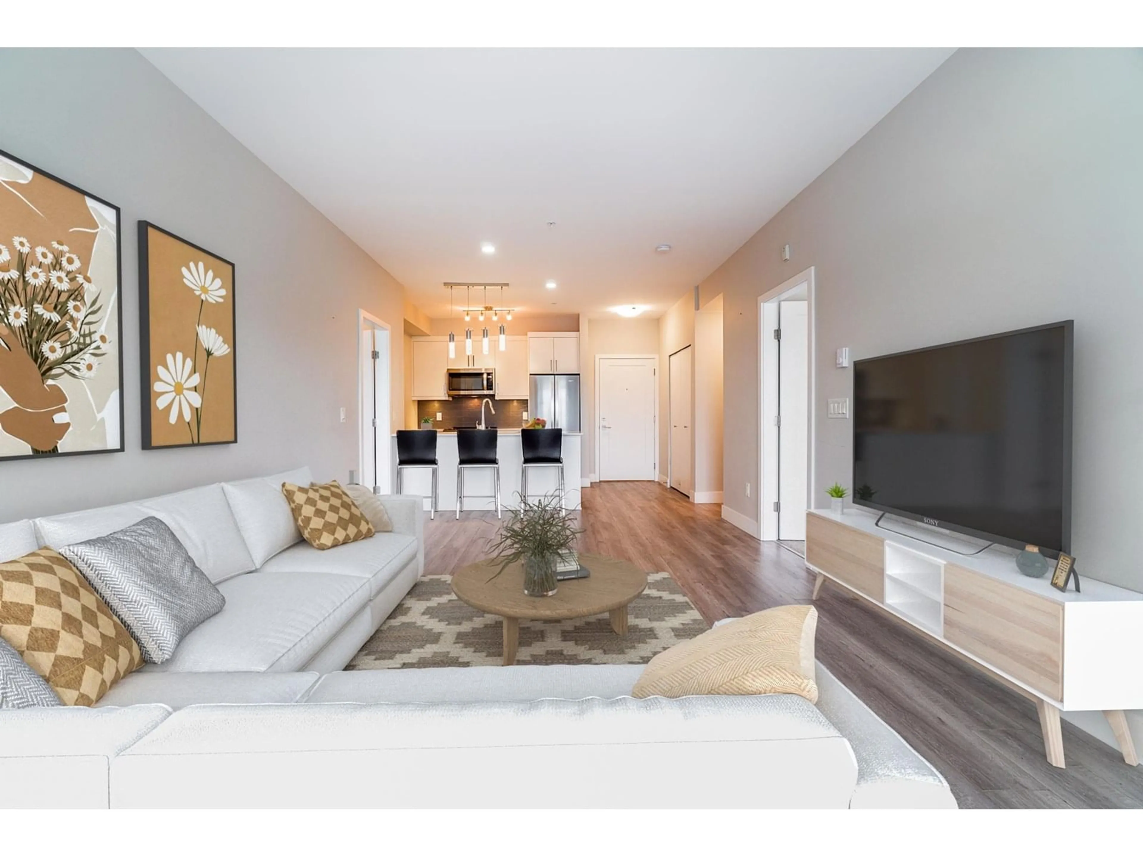 Living room with furniture, wood/laminate floor for 327A - 8635 120, Delta British Columbia V4C6R5