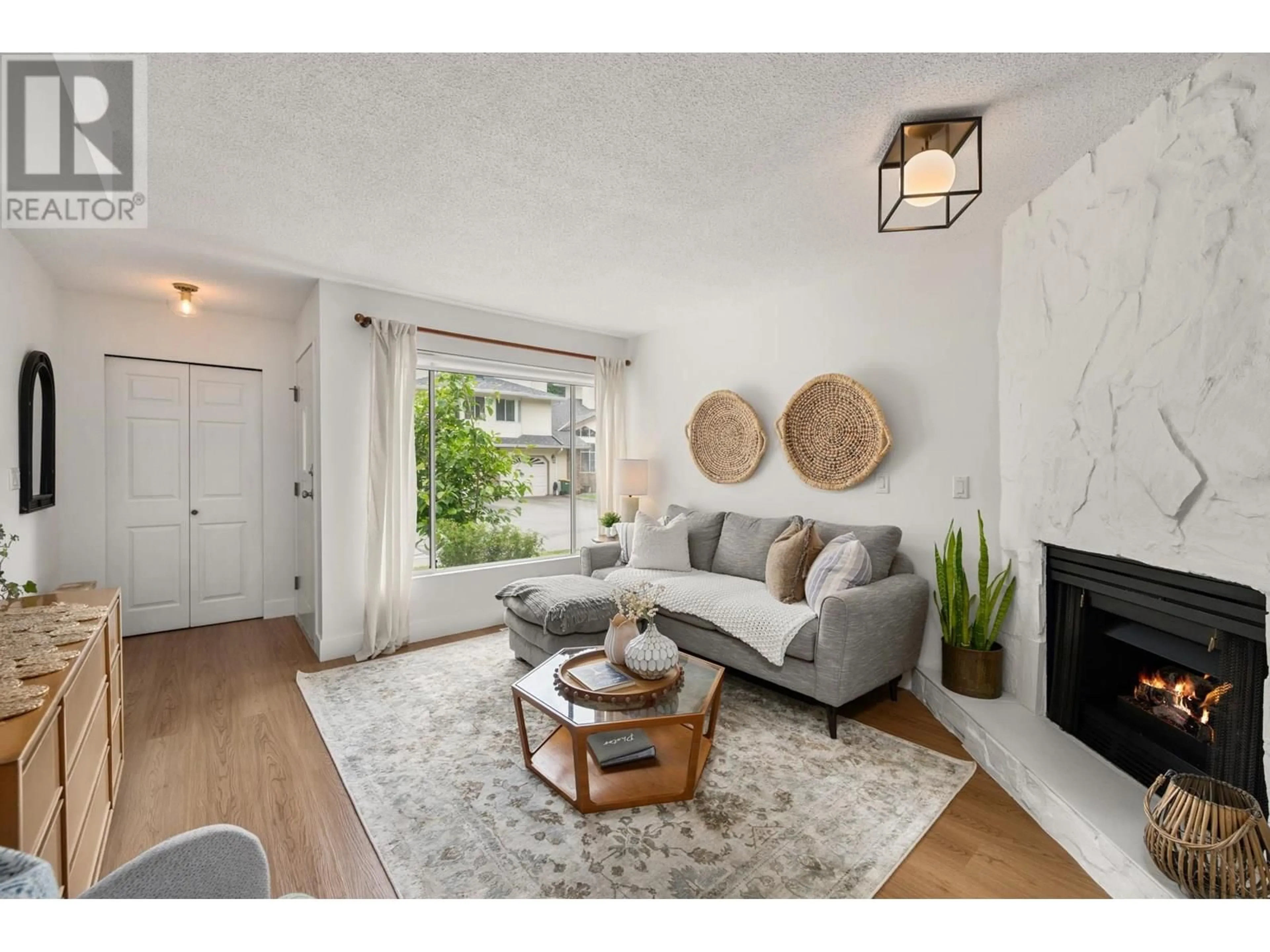 Living room with furniture, wood/laminate floor for 31 - 22900 126 AVENUE, Maple Ridge British Columbia V2X0W9