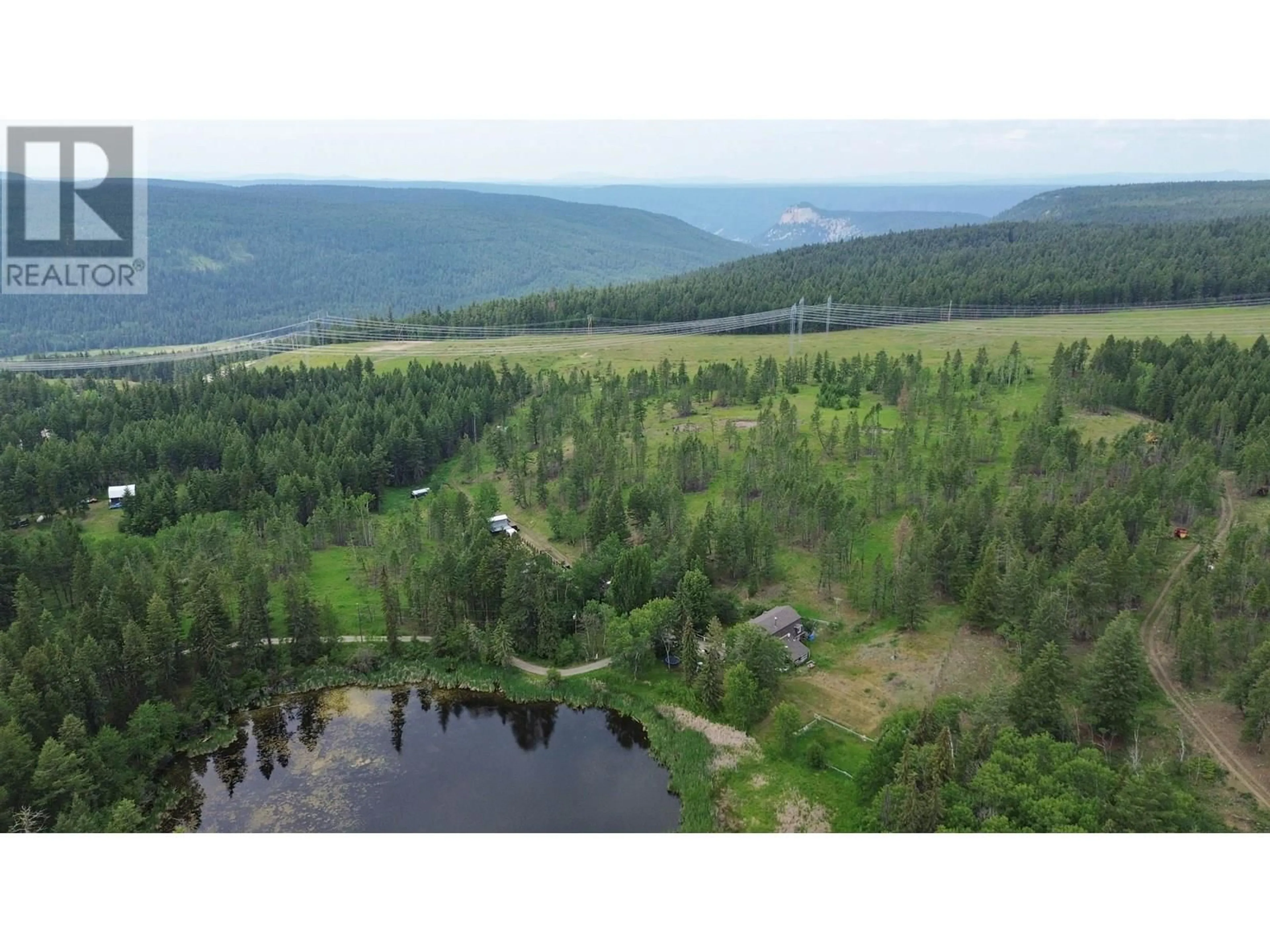 A pic from outside/outdoor area/front of a property/back of a property/a pic from drone, water/lake/river/ocean view for 1650 COYOTE ROAD, Williams Lake British Columbia V2G4X8