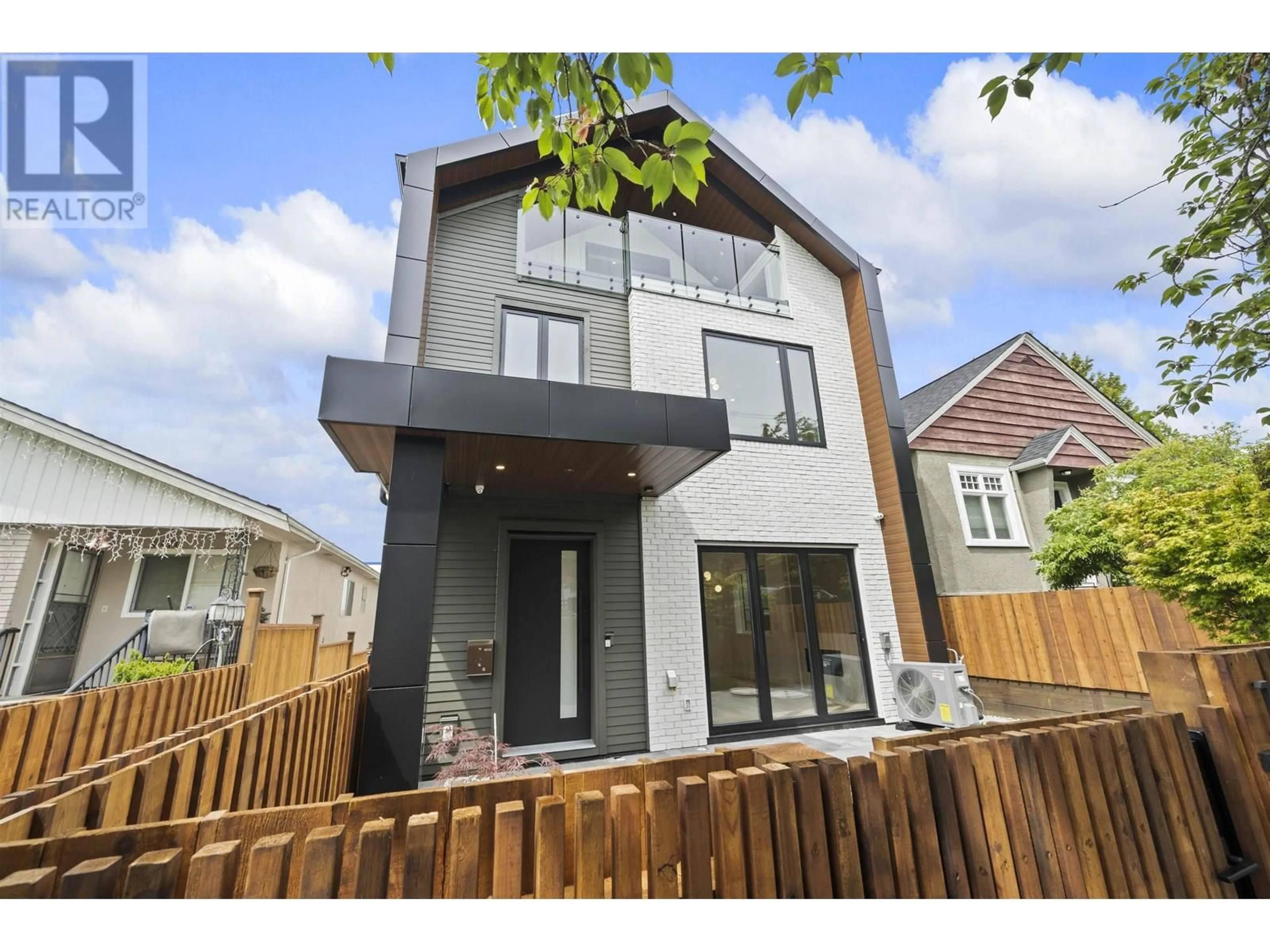 Home with brick exterior material, street for 1 - 6461 PRINCE EDWARD STREET, Vancouver British Columbia V5W2Y3