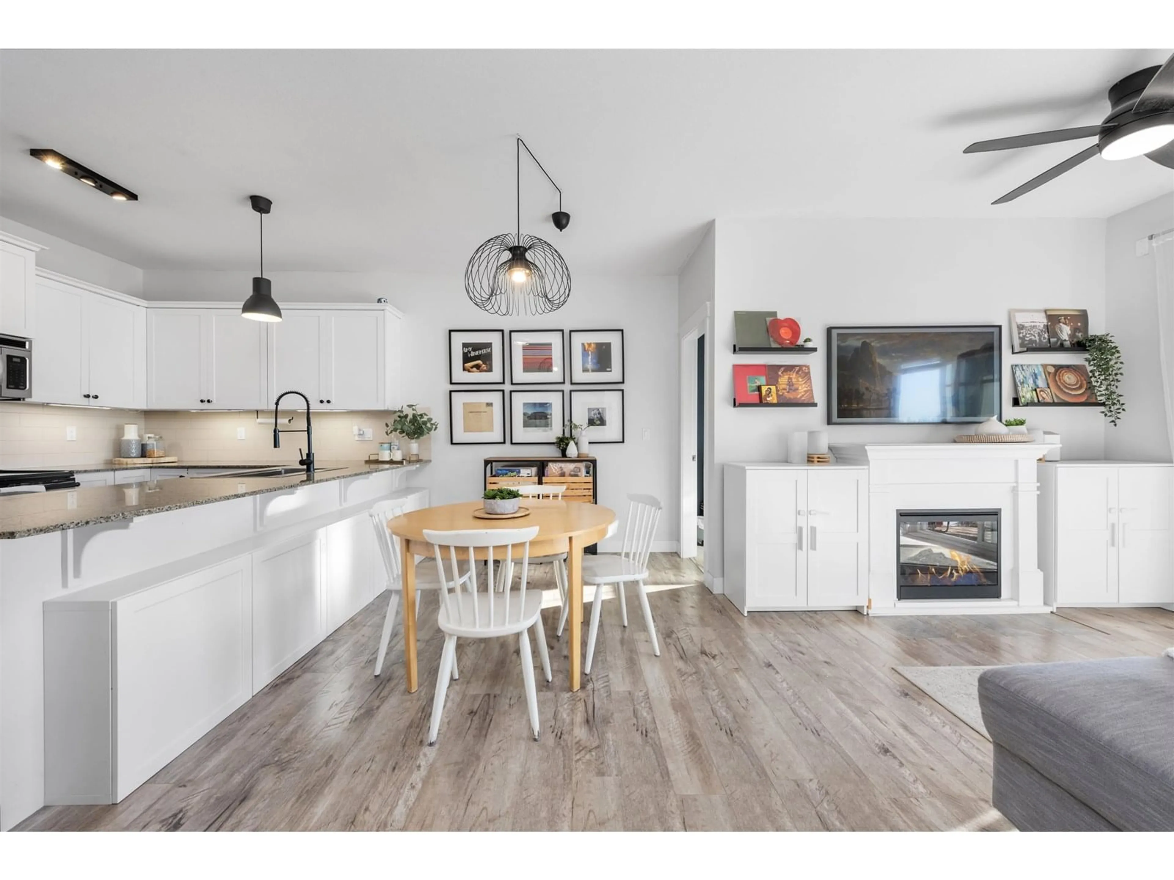 Open concept kitchen, wood/laminate floor for 408 - 17712 57A, Surrey British Columbia V3S1J1