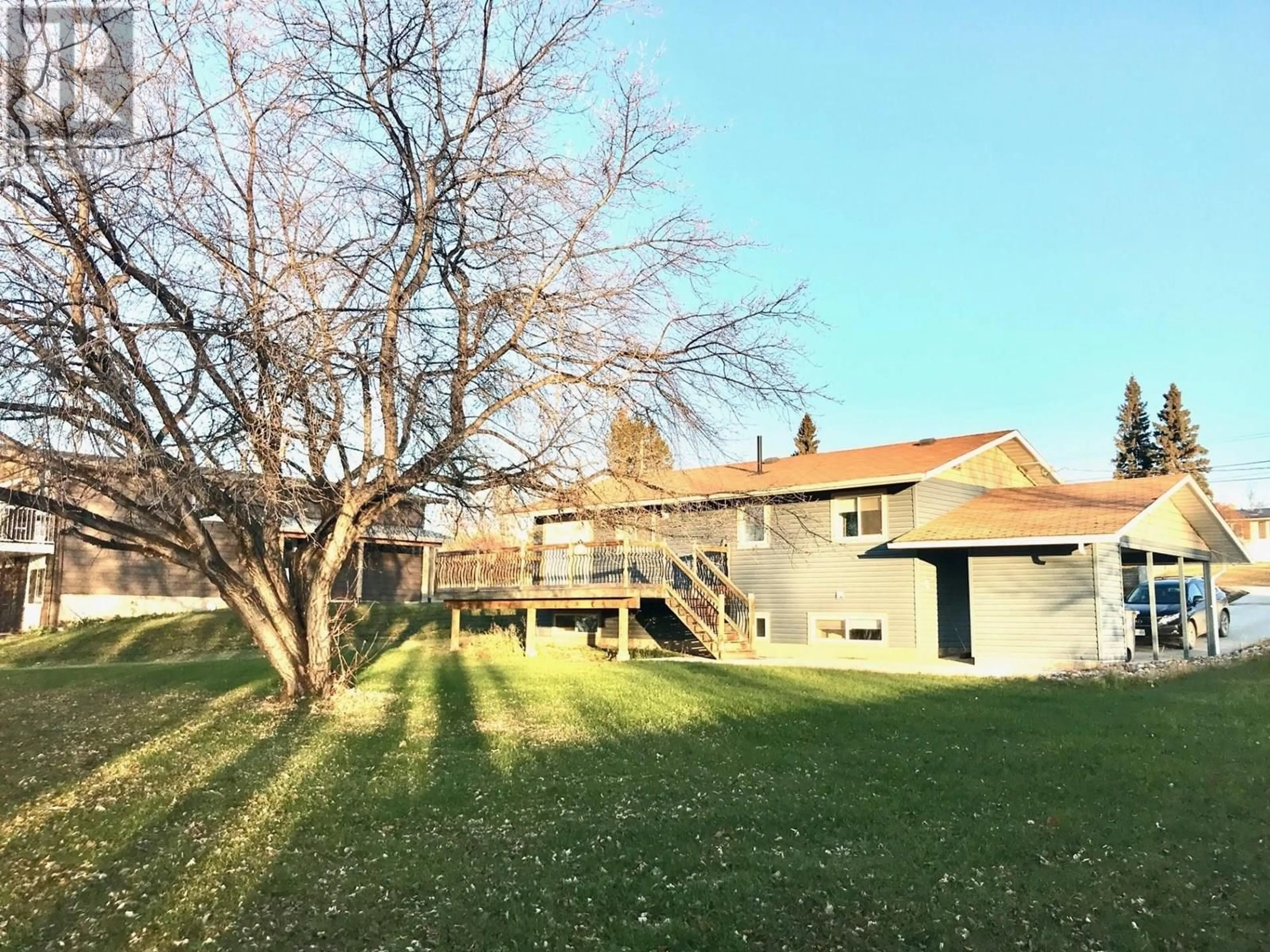 A pic from outside/outdoor area/front of a property/back of a property/a pic from drone, unknown for 5407 54 AVENUE, Fort Nelson British Columbia V0C1R0